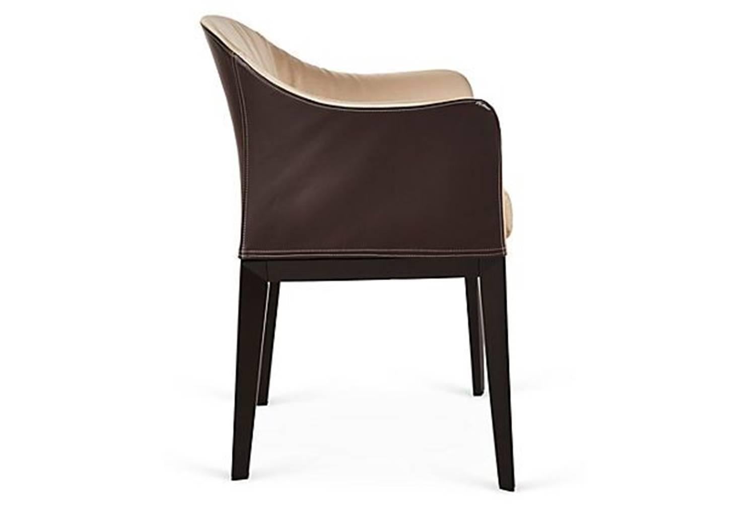 Giorgetti normal armchair in combination of leather and fabric.