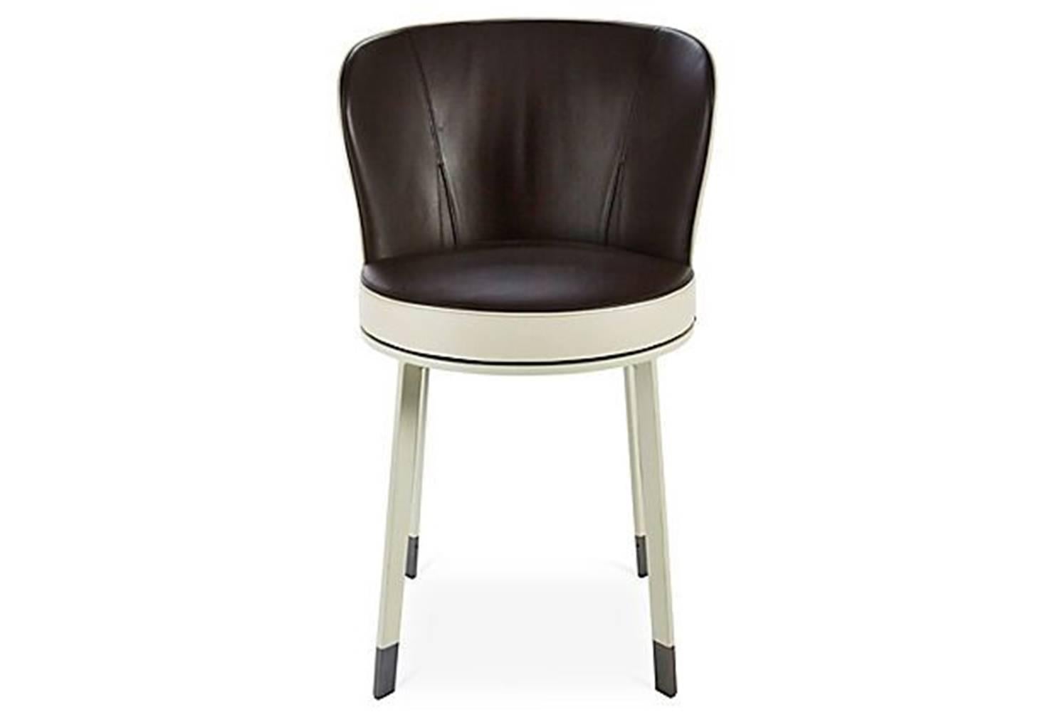 Giorgetti Ode swivel dining chair in leather.