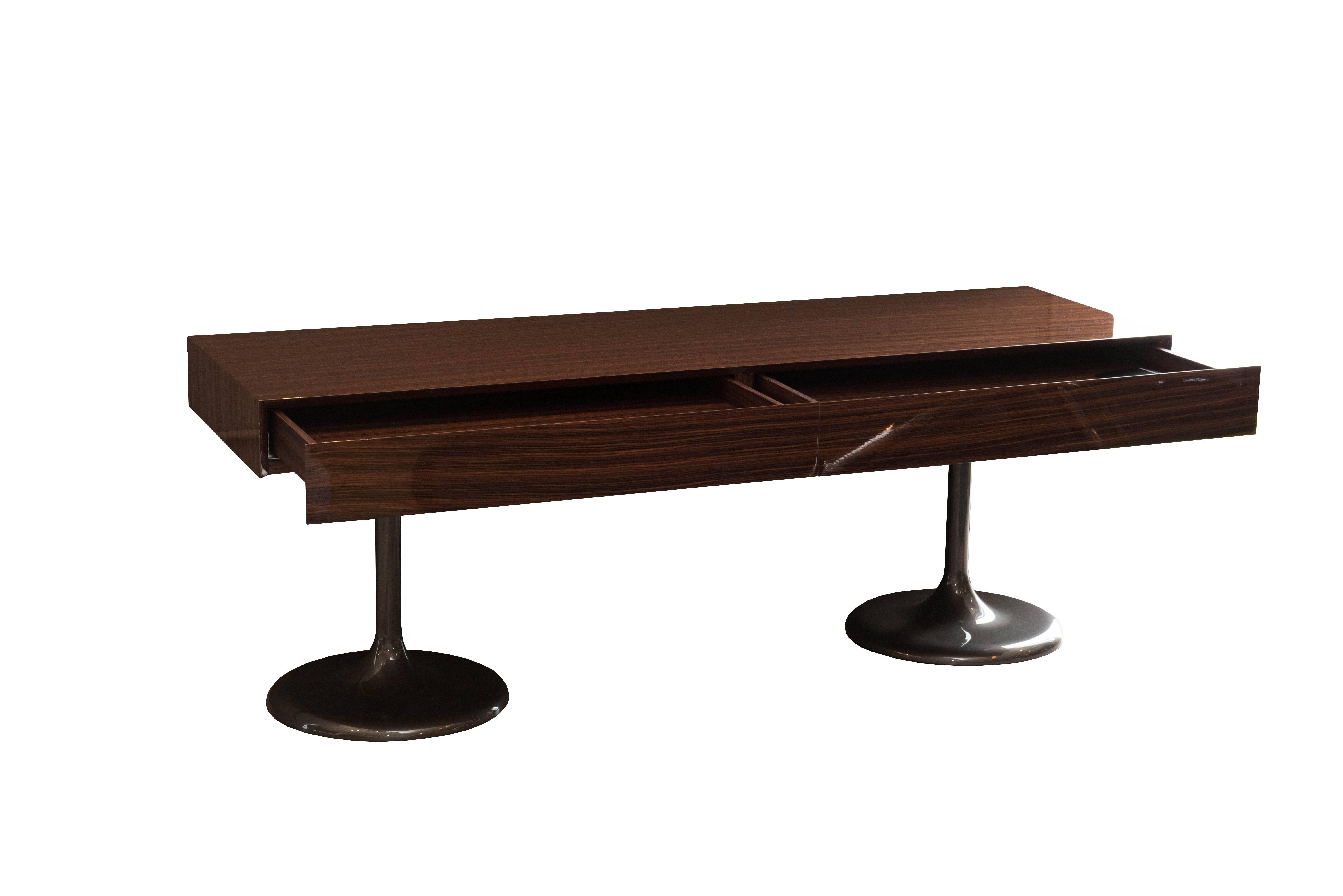Italian Glossy Walnut Console.

Base: molded structural polyurethane
(BAYDUR® 60) with metal load-bearing
structure and counterweight plate. The
base is available in a glossy Pewter colored
finish.

Top: upper top surface in box-section
MDF