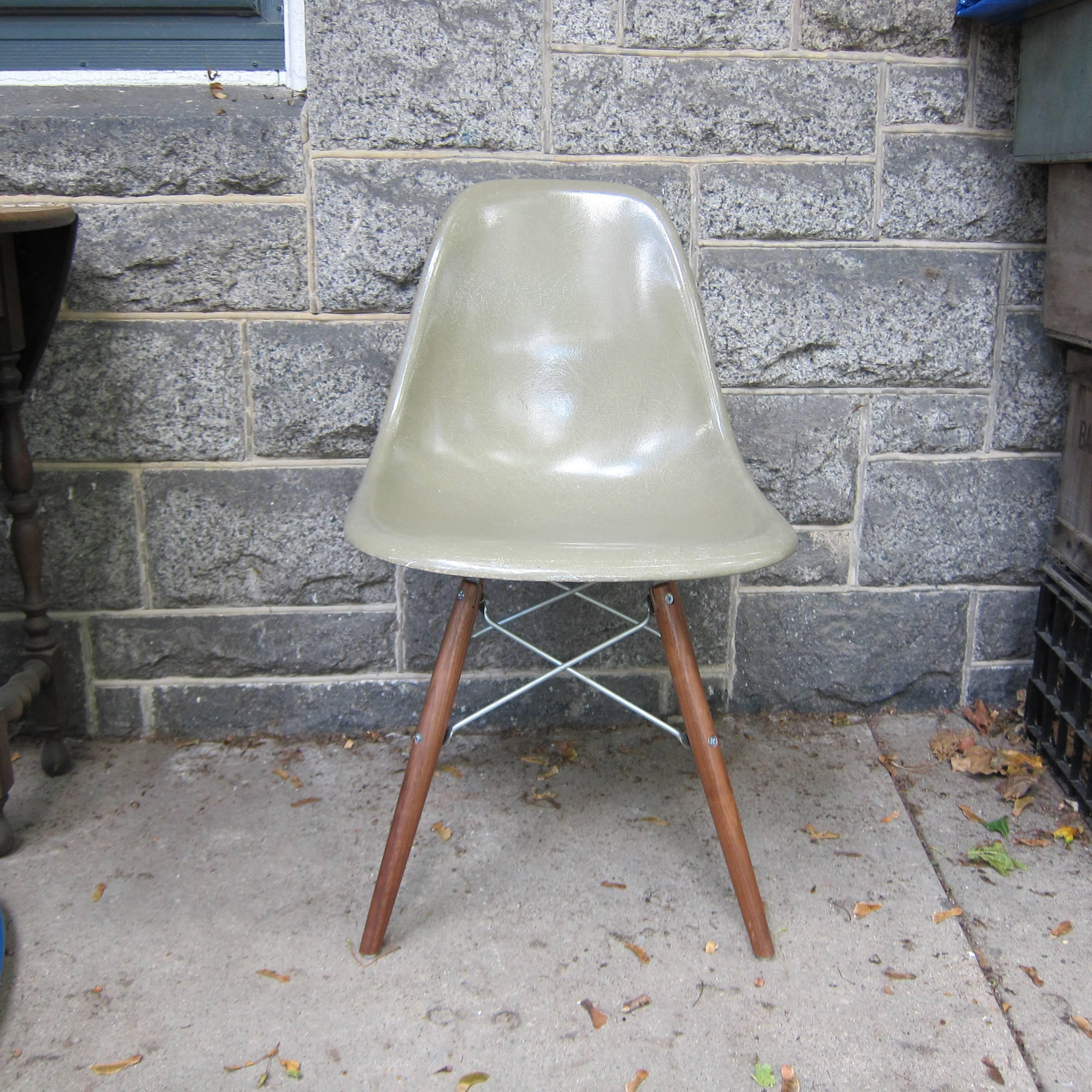 Eight Multicolored Herman Miller Eames Dining Chairs 1