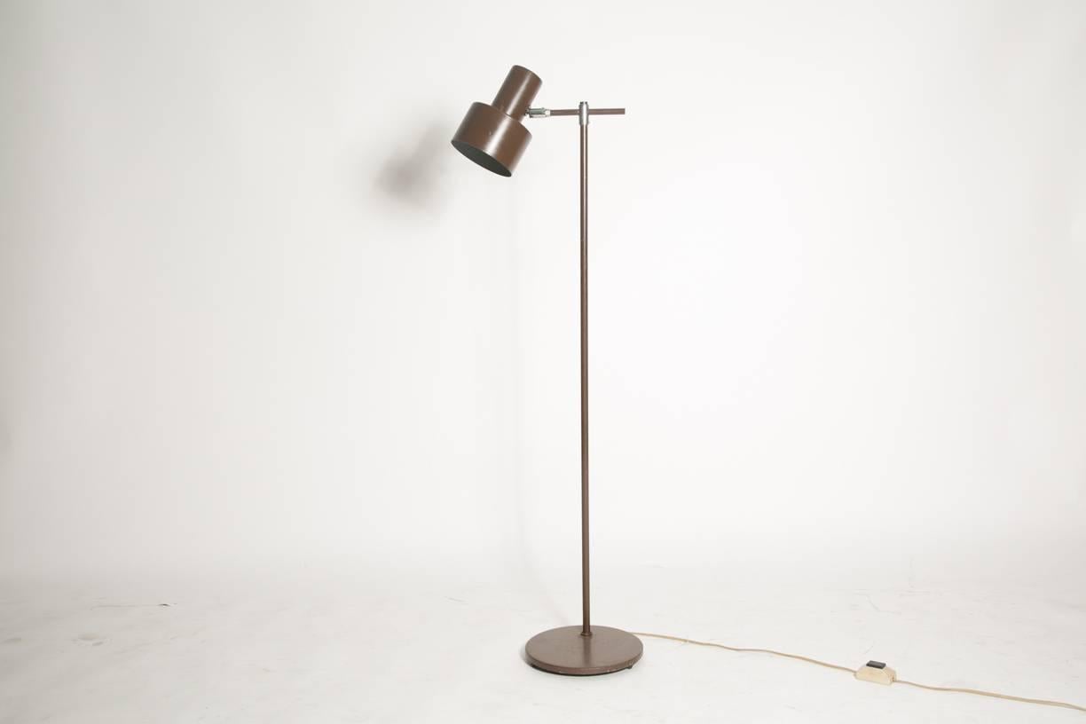 Excellent brown laquer lamp from renown lightning designer Jo Hammersborg. He became in 1957 head of design at Fog and Mørup therefore leading to the most commercially and artistically flourishing period of Fog and Mørup. The head is