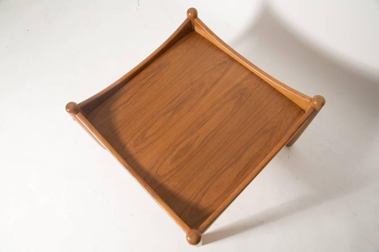 Norwegian sculptural teak tray top table. Pleasing teak grain. Add a pillow and use as an ottoman!
   