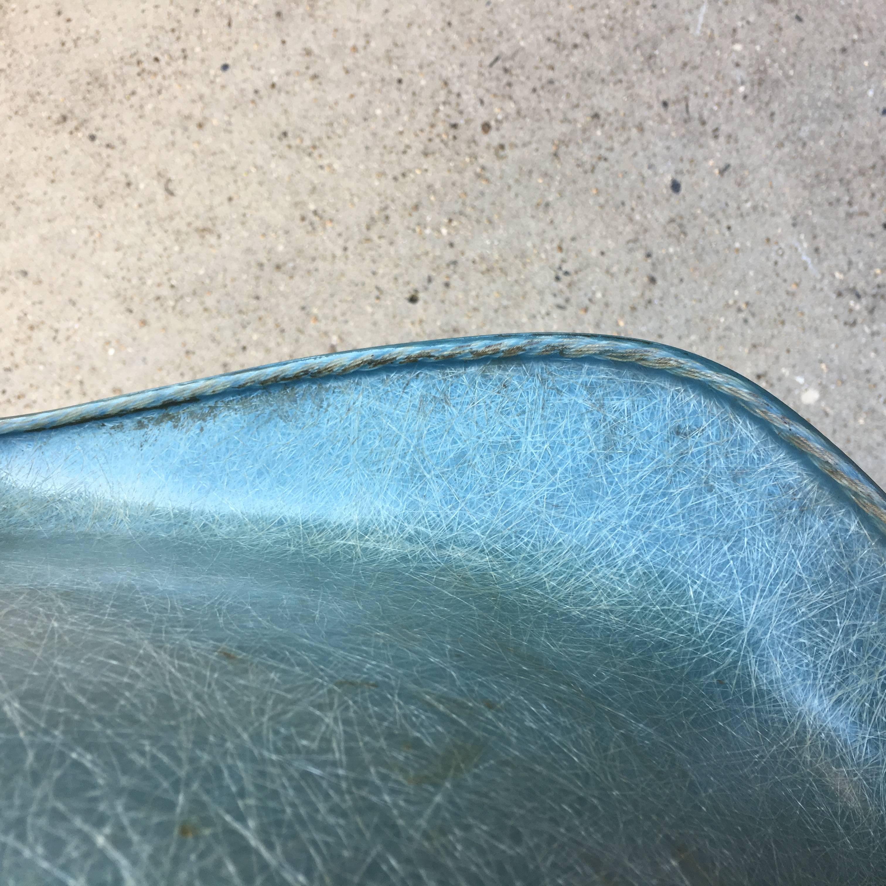 Rope edge Eames RAR rocker in extremely rare seafoam green from the first or second year of production. In as found condition with no repairs. No cracks or fading to shell. Normal wear. Base is sturdy and runners have not been refinished. Lighter