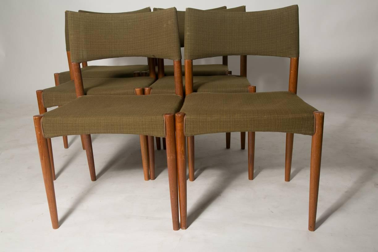 Set of six chairs designed by V.S. Andersen for Schou Anderson in teak and green fabric with interesting lines and build techniques. Frames are in good vintage condition but seats and backs should be reupholstered. Contact us for