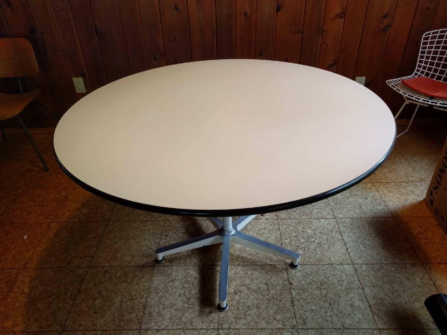 Rare early Eames for Herman Miller 650 model dining table. Same five star aluminum base as found on the Eames lounge chair. White laminate top. Only produced this way for a few years. Rare white column and base. The only example we have ever come
