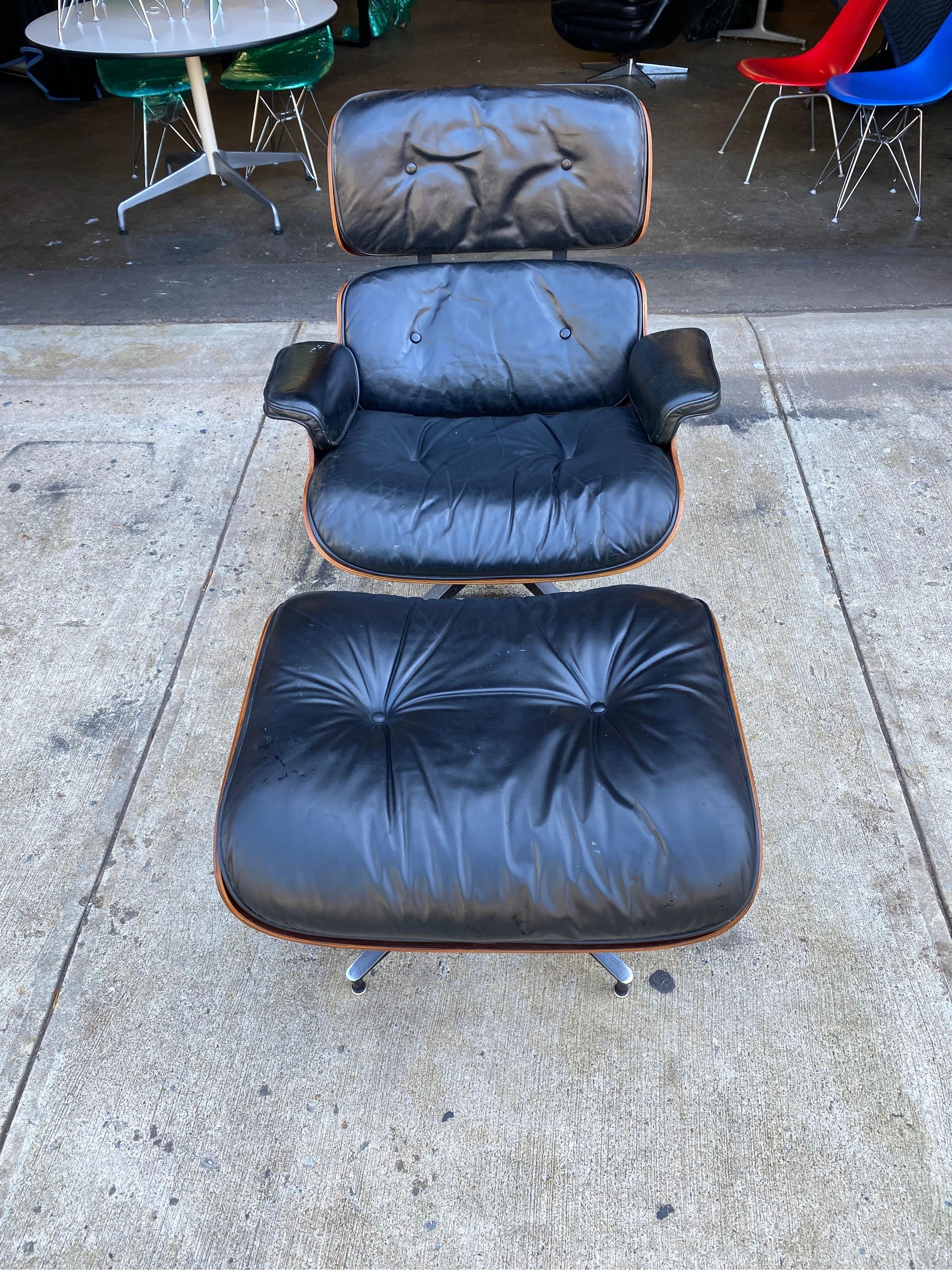 Vintage Eames lounge chair and ottoman set, circa 1960s. Signed and guaranteed authentic. Original al leather with down feather cushions. All parts intact. Replaced seat rubber shock mounts ($500 value). Wood refinished and the color is spectacular.