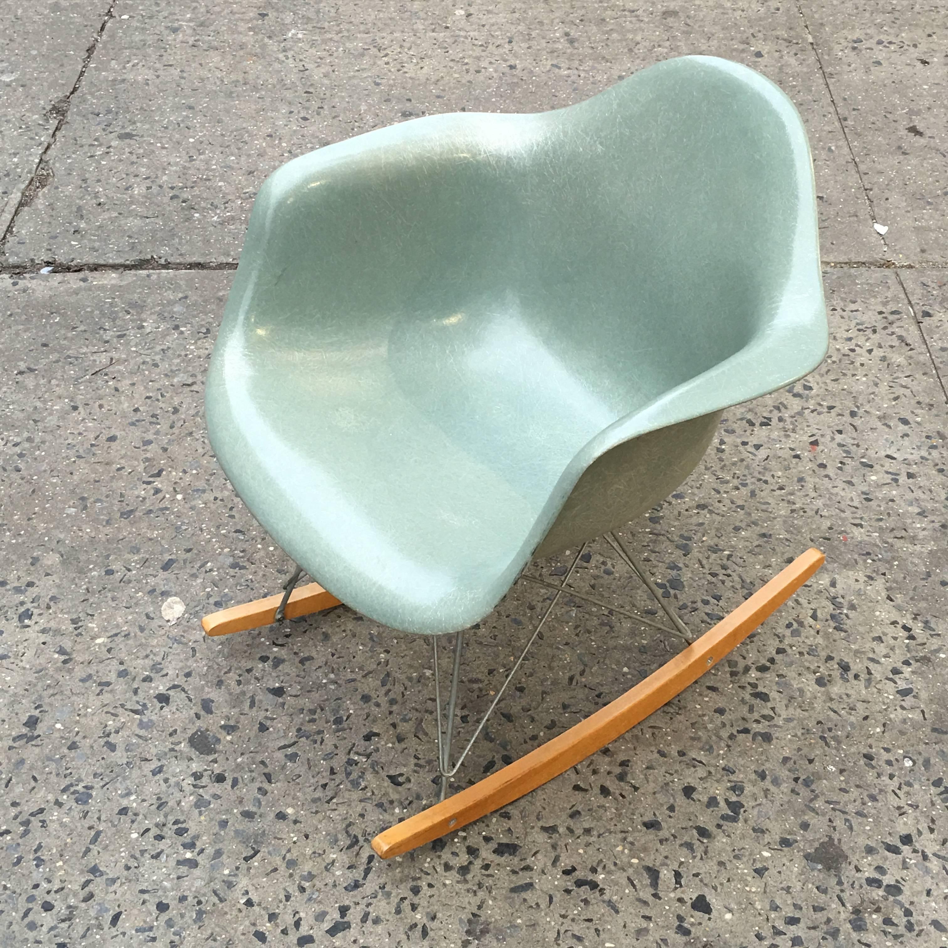 Rare Seafoam Green Herman Miller Eames shell on new base. Shell is in excellent vintage condition. No fading, cracks, or gouges. Normal wear consisten with age and use. Base available in black or chrome. Birch runners. Chair signed and dates to the
