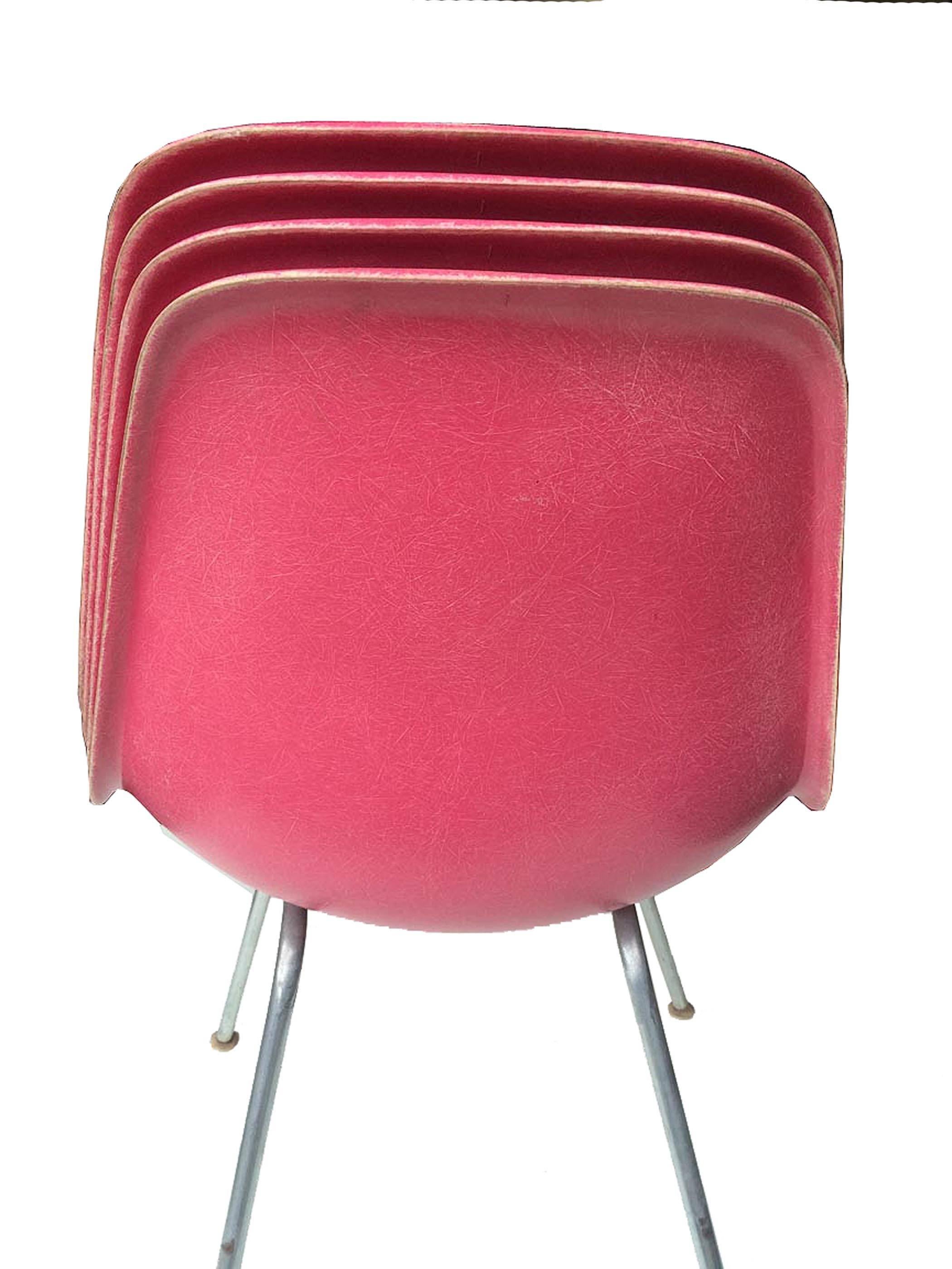 Among the rarest special order colors: Pink. Lovely set of 4 Herman Miller Eames fiberglass chairs on H base. Other bases available: Lounge, Eiffel, Dowel. Very good vintage condition with normal wear and use. Not many sets like this out there.