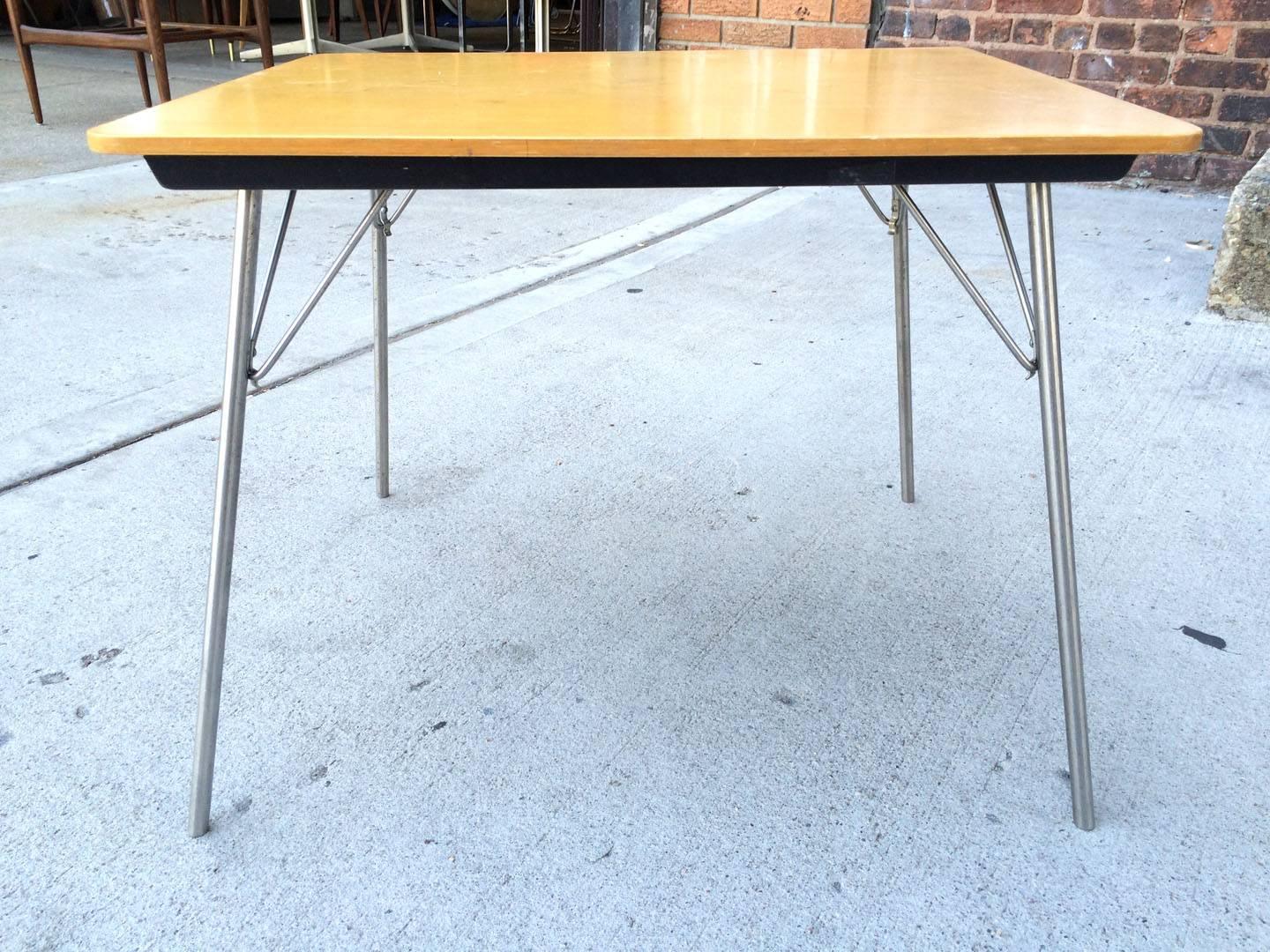Rare Herman Miller Eames IT-1 Incidental folding table. Birch top. Very good condition from early 1950s with original label. Normal wear commensurate with age and use.
