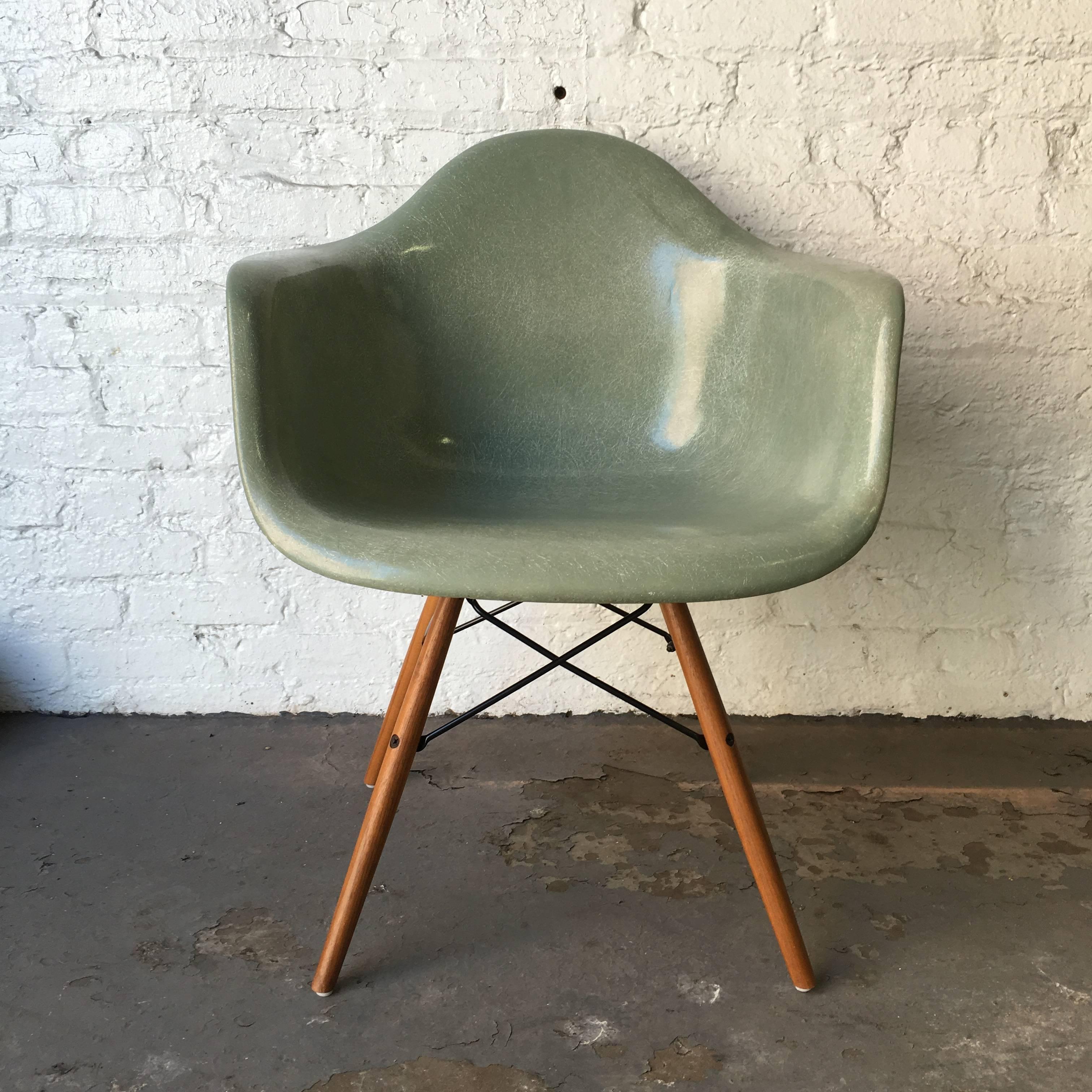 Herman Miller Eames fiberglass armchair in seafoam green. Exceptional color with no fading or cracks. Newer dowel base.