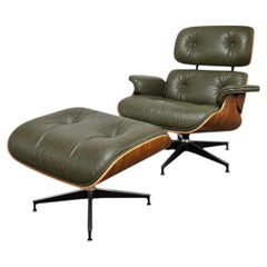 Wunderschöner Avocado Eames-Loungesessel und Ottomane