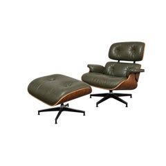 Wunderschöner Avocado Eames-Loungesessel und Ottomane