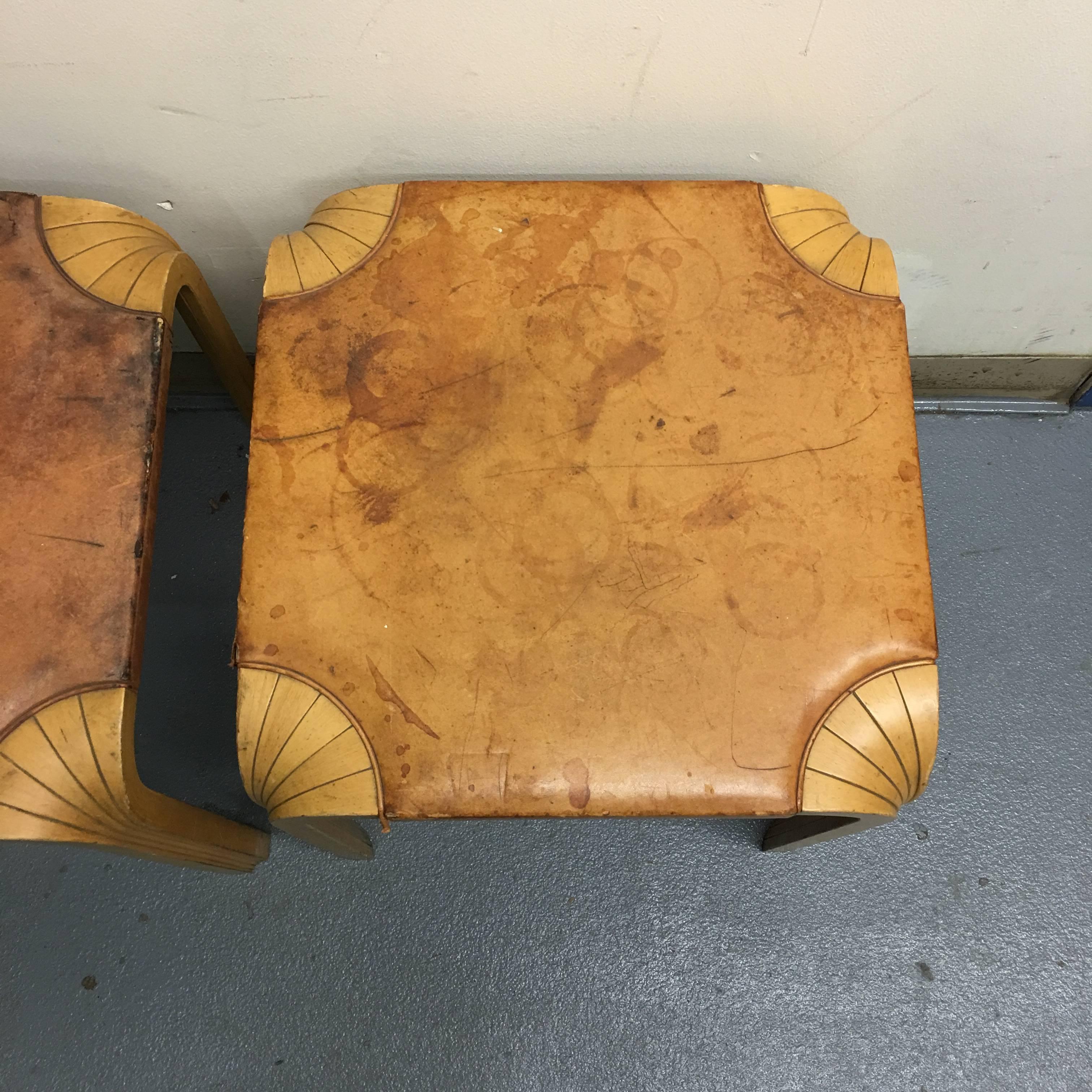 Two Alvar Aalto fan leg side tables/stools. In original condition. Should be reupholstered. Birch wood in very good condition with normal wear. Excellent paint to legs.