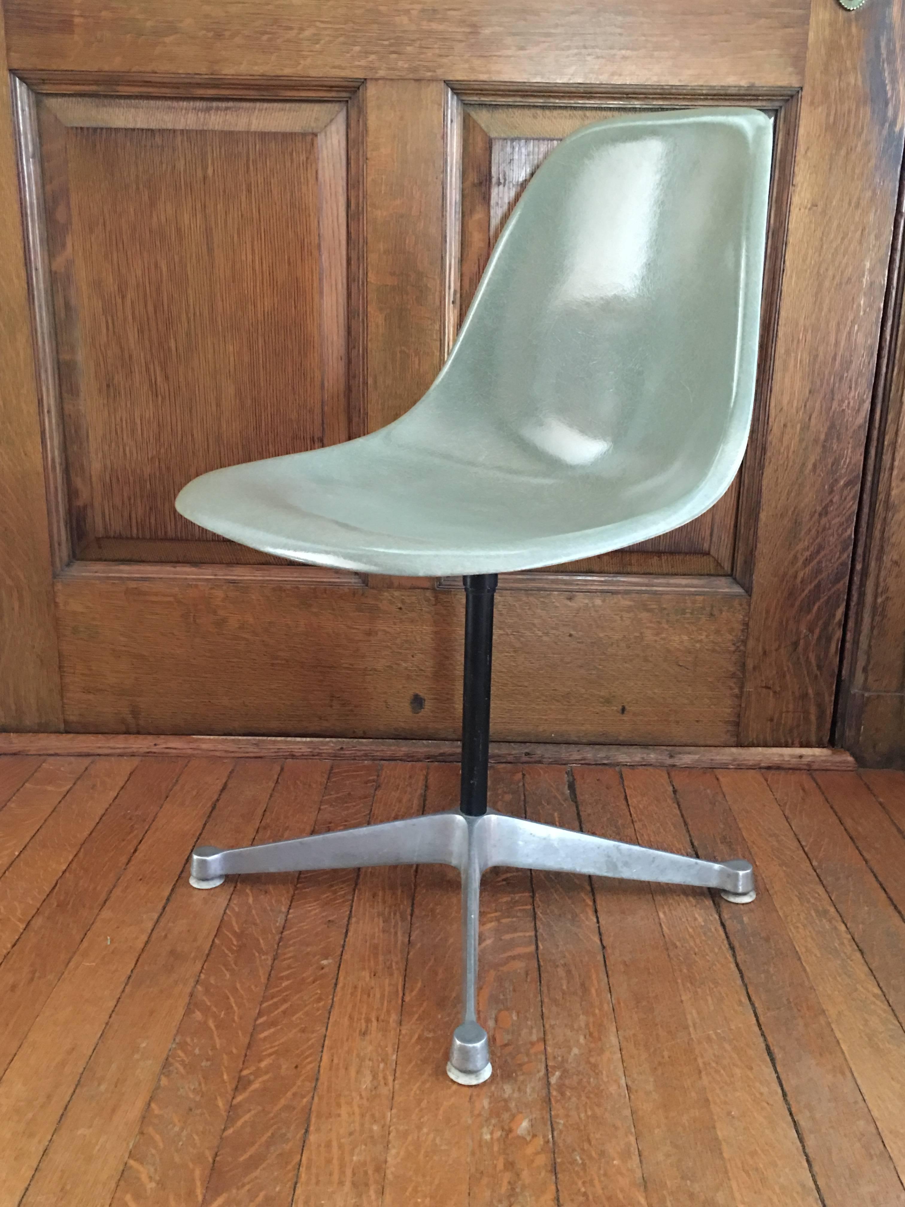 Herman Miller Eames seafoam green desk chair on aluminium contract base. Shell in perfect vintage condition. Base excellent with normal wear. Swivel function is perfect and smooth with no friction or noises.