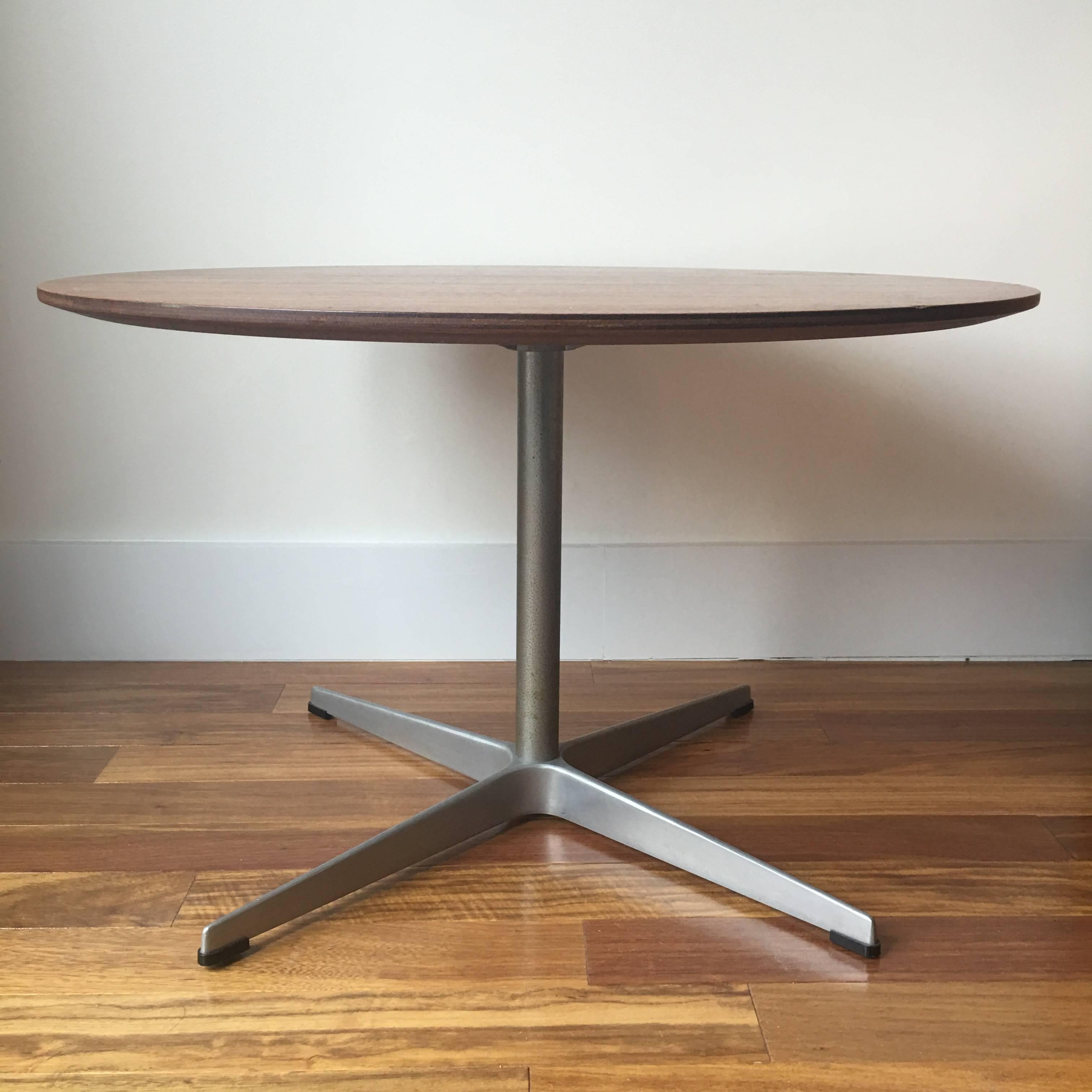 Arne Jacobsen for Fritz Hansen teak coffee table. Four star aluminium base with original glides. Signed.