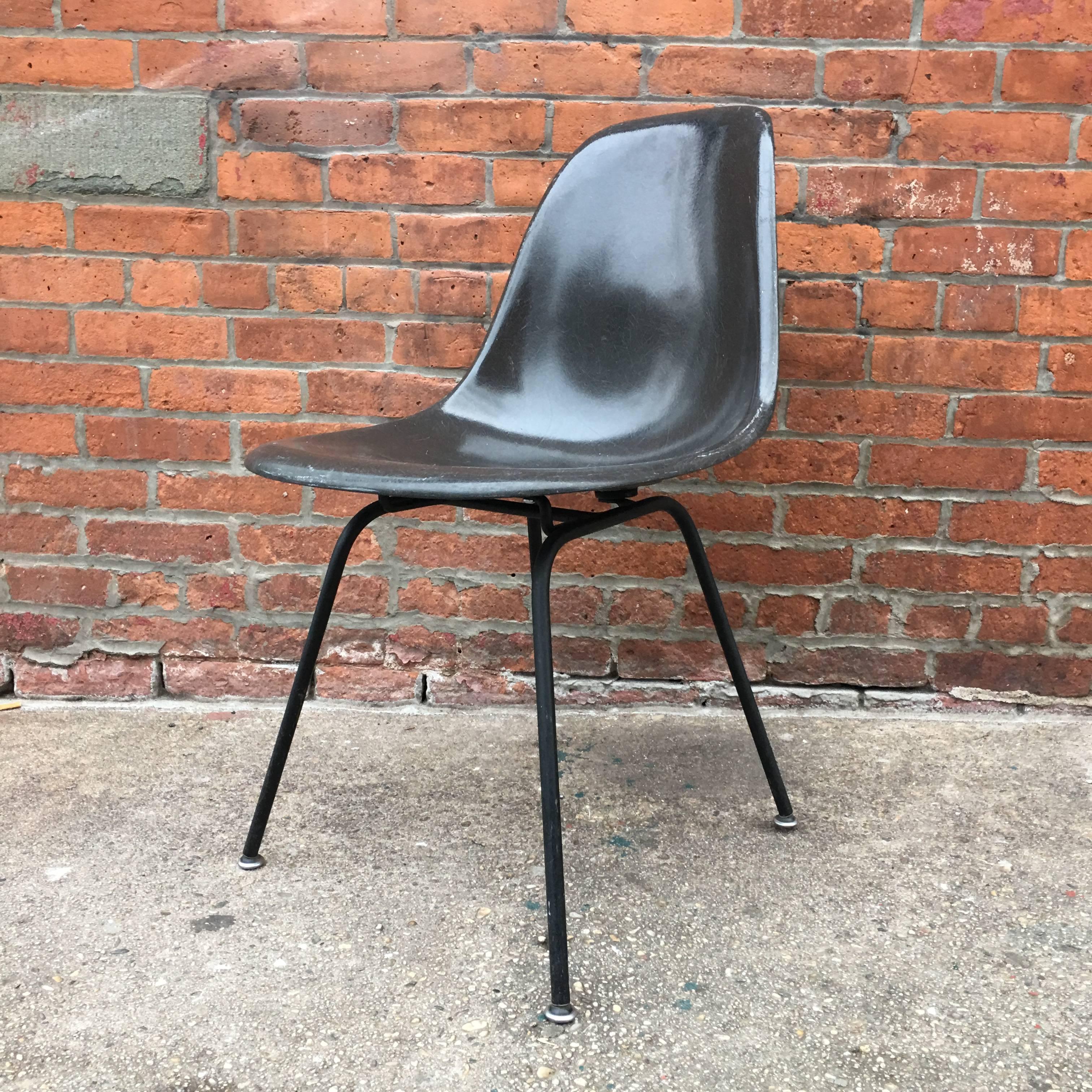 Ten Herman Miller Eames DSX dining chairs in rare black. Black was a special order color and was produced in limited quantities. Also available in zinc-plated original Herman Miller bases. Note that the glides on these bases will be white not as