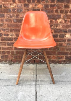 Four Multicolored Herman Miller Eames Dining Chairs