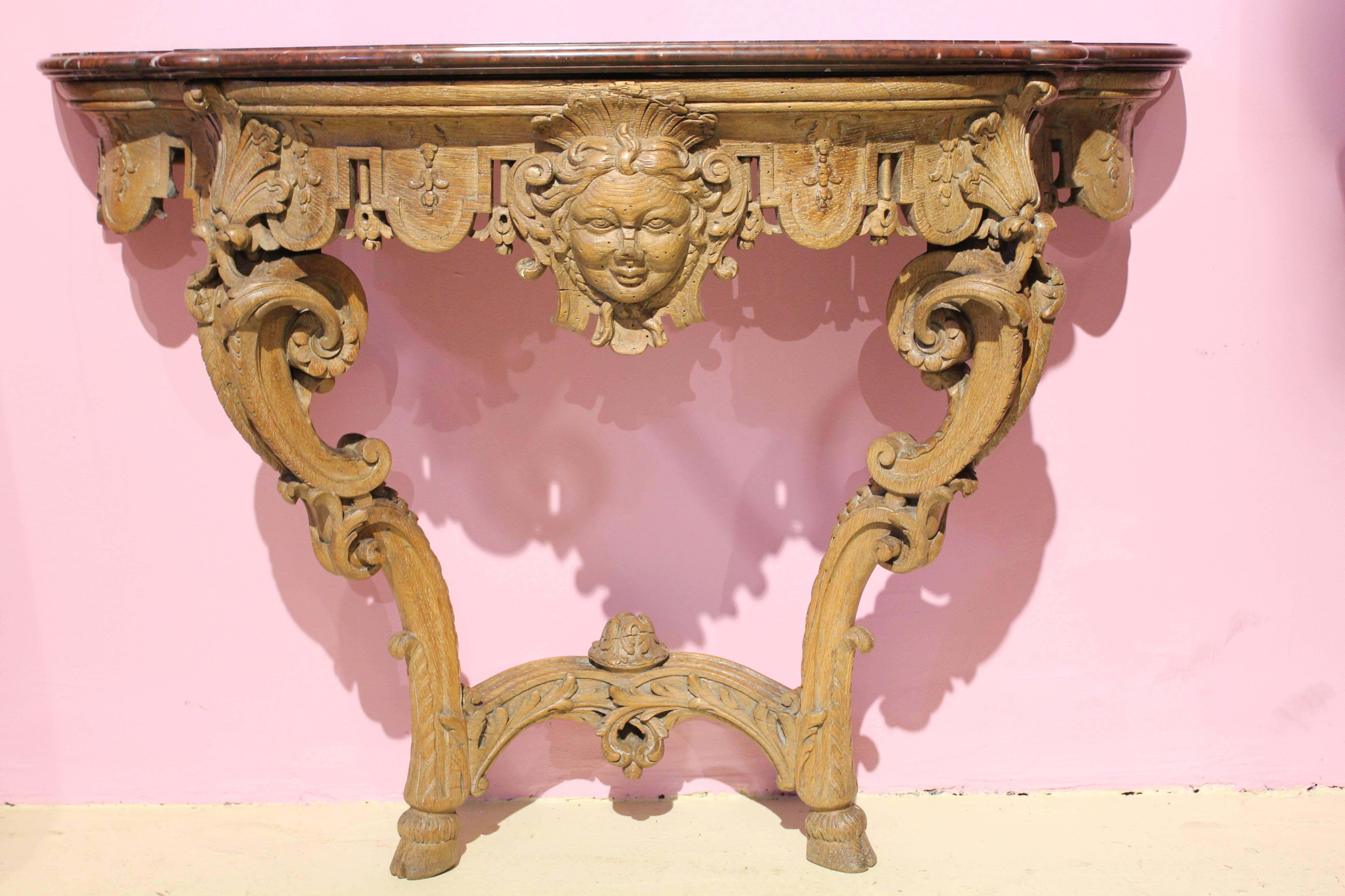 Console
Regency period, 18th Century
France
Oak and Marble

This beautiful console is of the Regency period in France, during the first part of the 18th century.
The wood (oak) is sculpted in the most beautiful way, using the stylistic codes