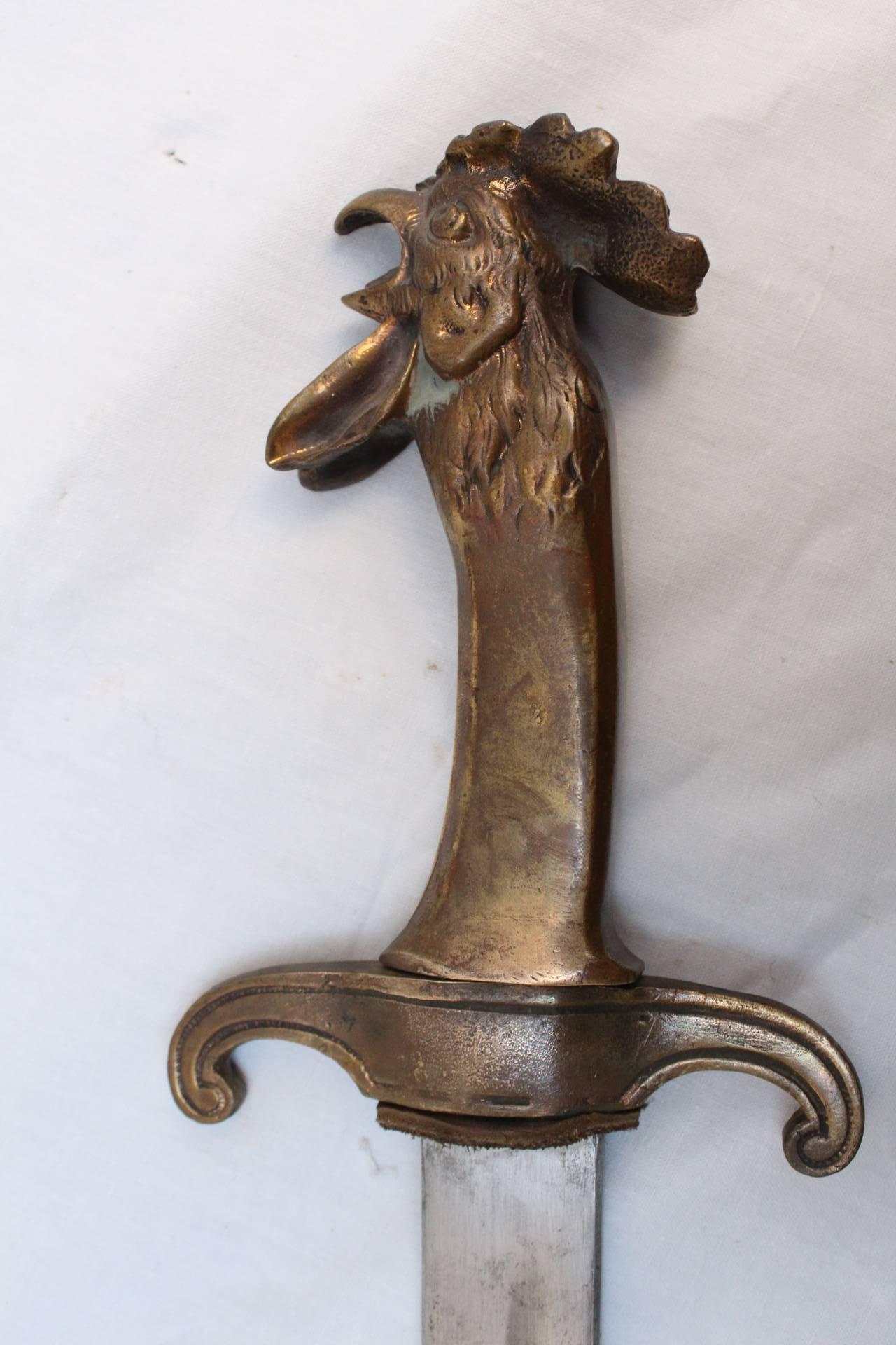 Sword with a rooster head
Model from the Louis-Philippe period (circa 1830, France), which rooster head was recognizable for the superior officers of the National Guard (Officier Supérieur de la Garde Nationale). 

This piece is from the middle
