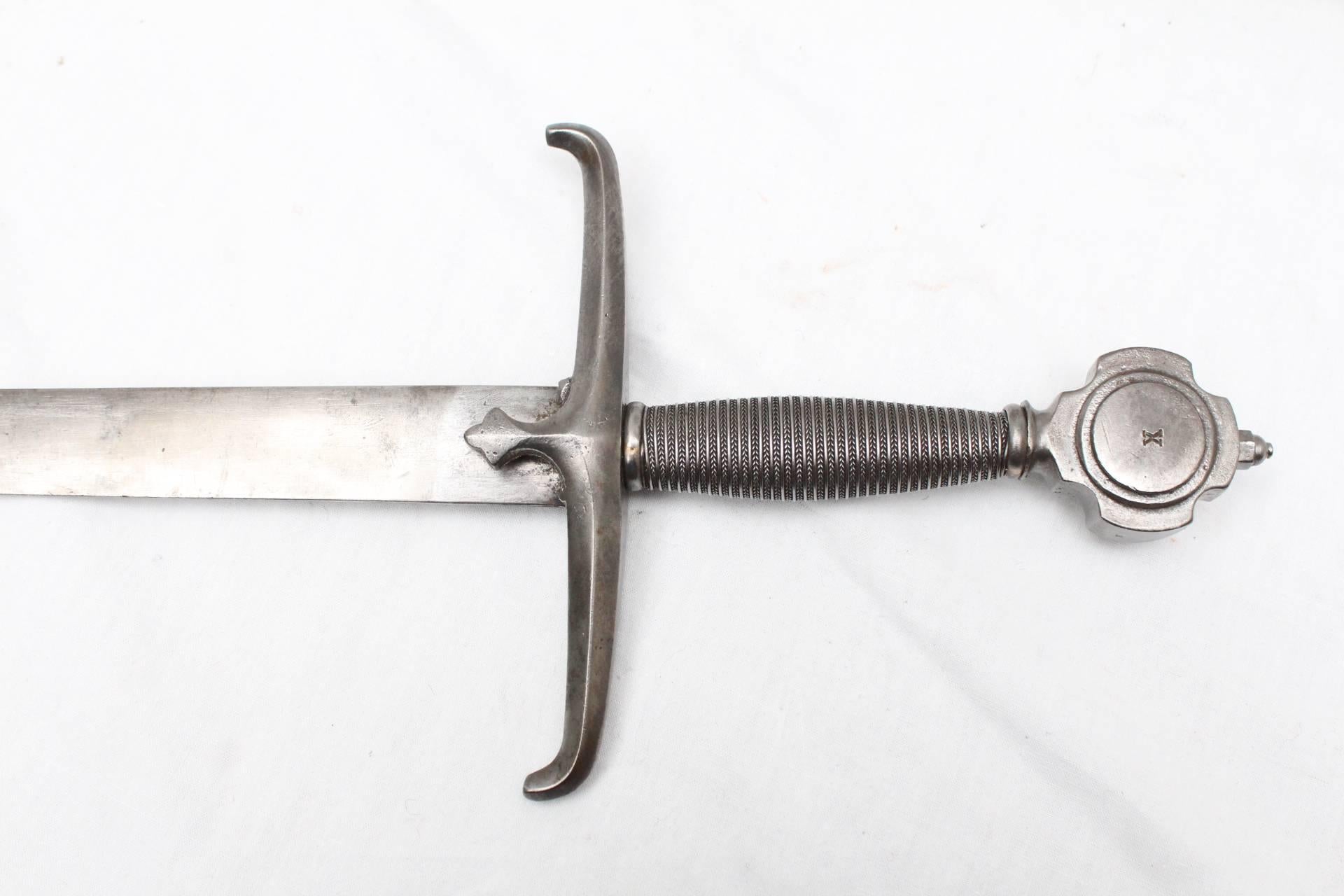 Sword in medieval style
19th Century 
France

This piece was part of a collection. 

More models available, please contact us for any further information. 