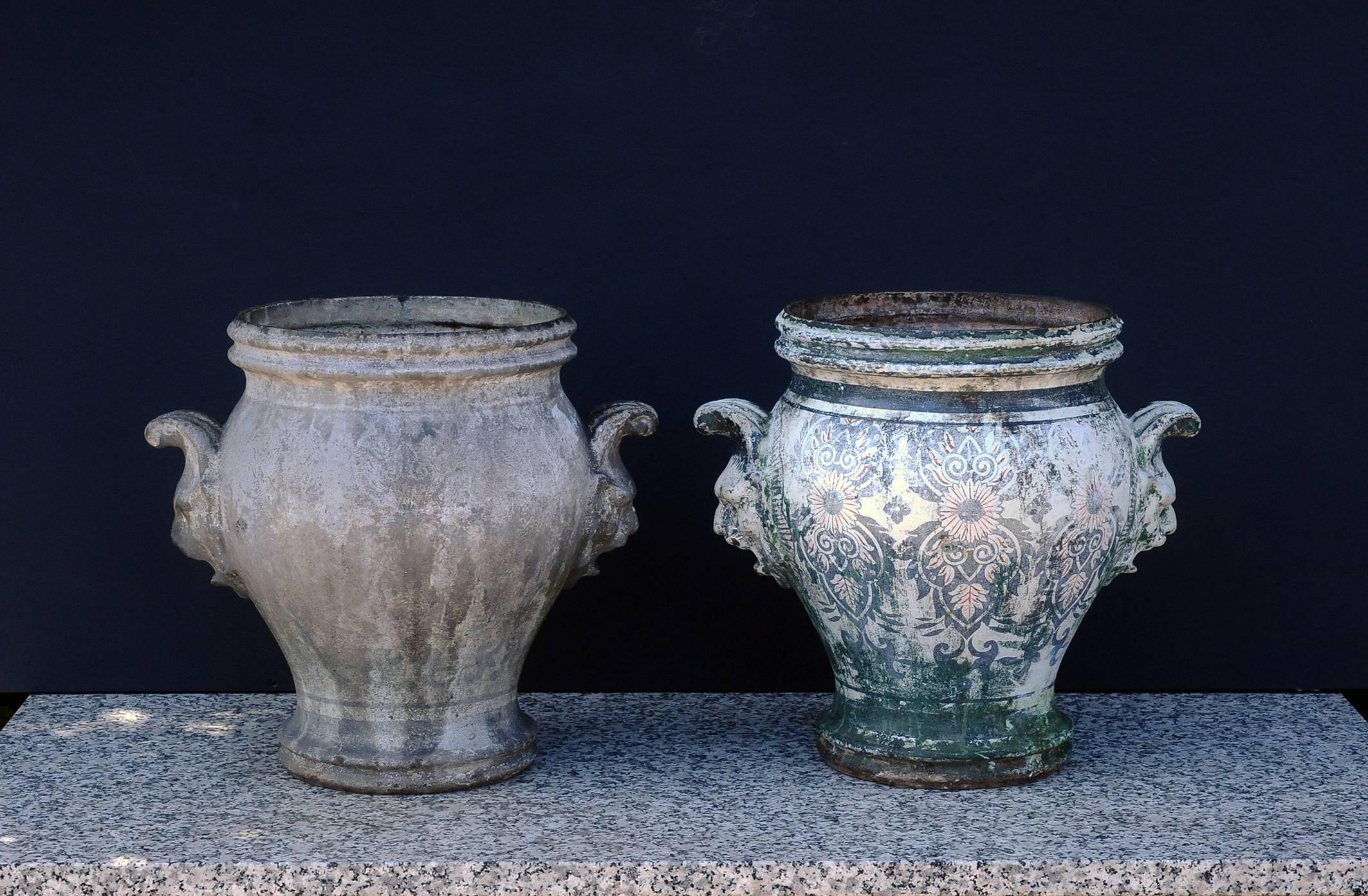 Pair of planters.
Cast iron enameled,
circa 1850.
From the town Rouen in the north of France (Normandy).
One restoration on the bottom of one the planter who still have a clean enameled.
One of the planters has taken the wear of the weather as