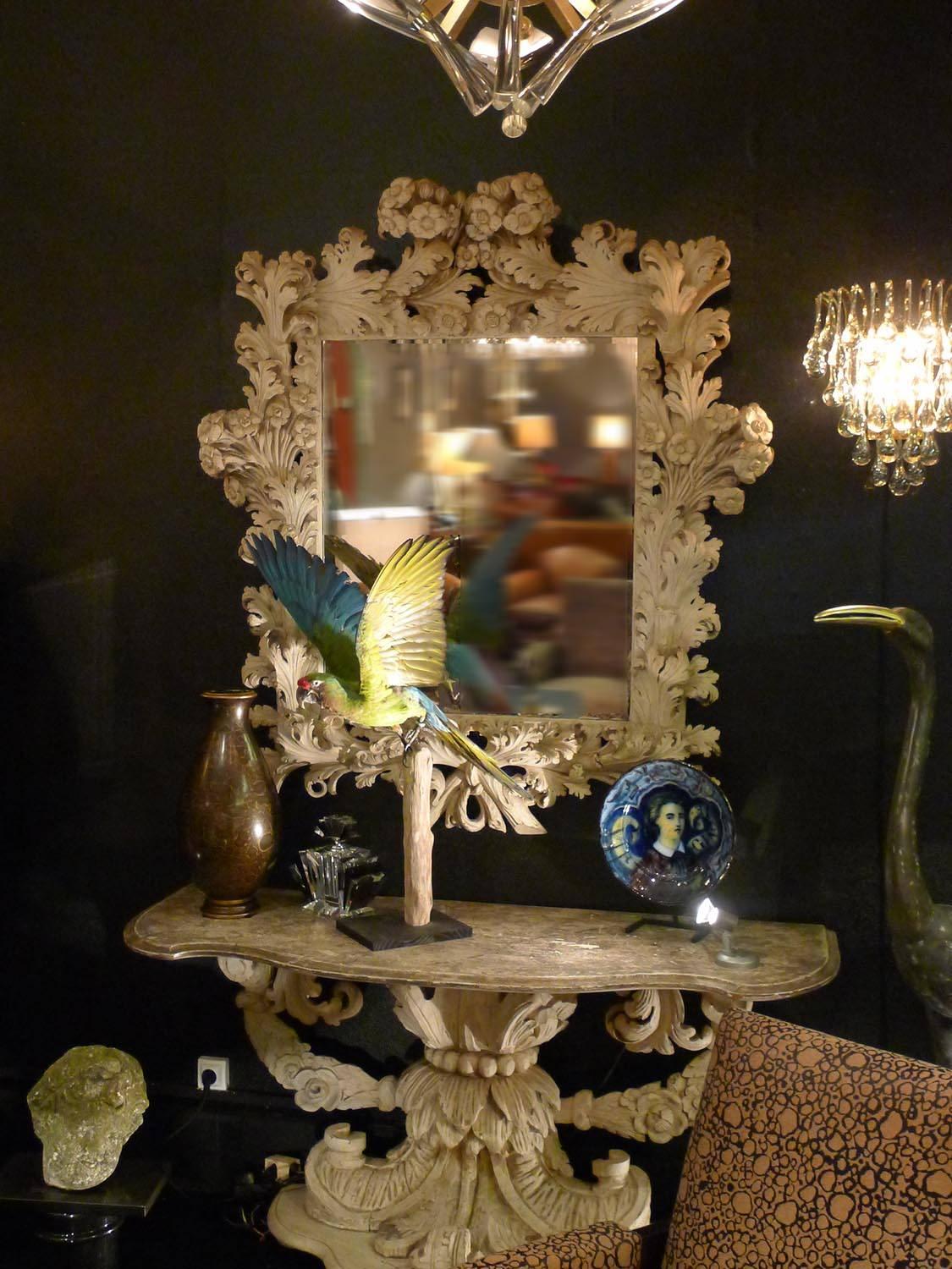 A spectacular mirror in wood motif flowers motion leaf style Louis XV in the period, circa 1940 in Baroque style.
The mirror is mercury technic, 
We have also the console live togther in wood with the motif flowers.
The mirror and mercury.
An