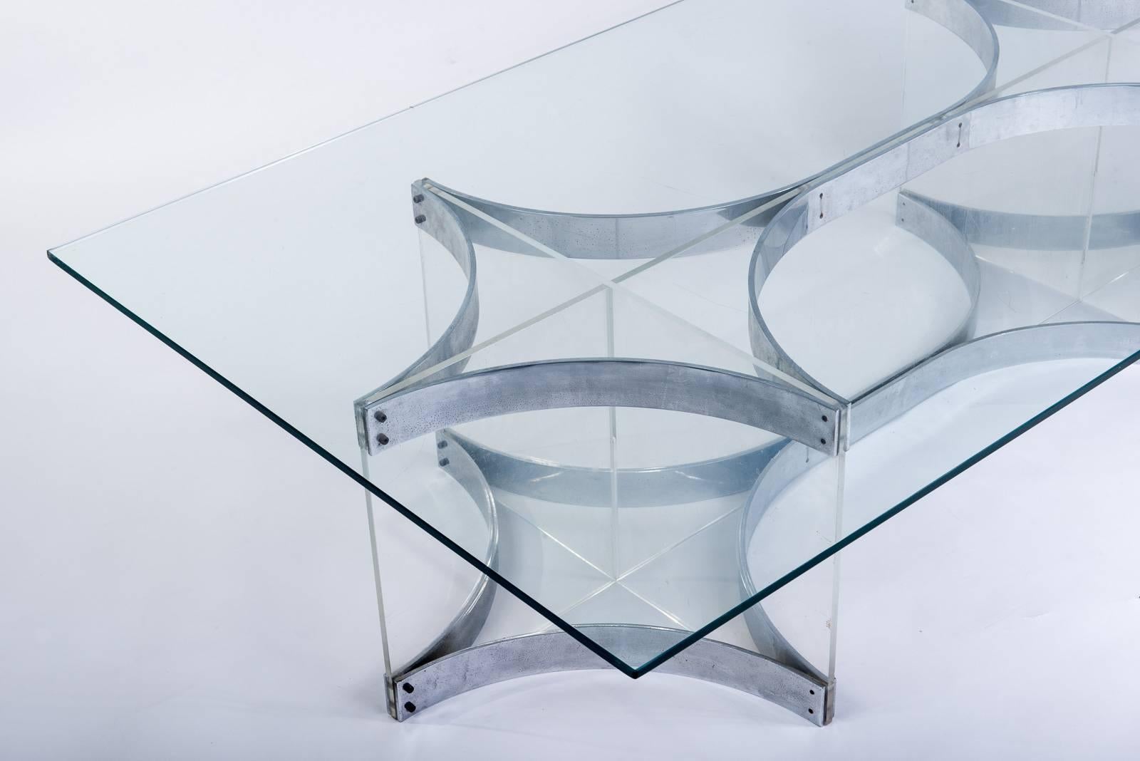 A low table by Alessandro Albrizzi, Italian Designer, circa 1970.
The base is mixed with chrome metal and an altuglas connection with a top in glass.
 