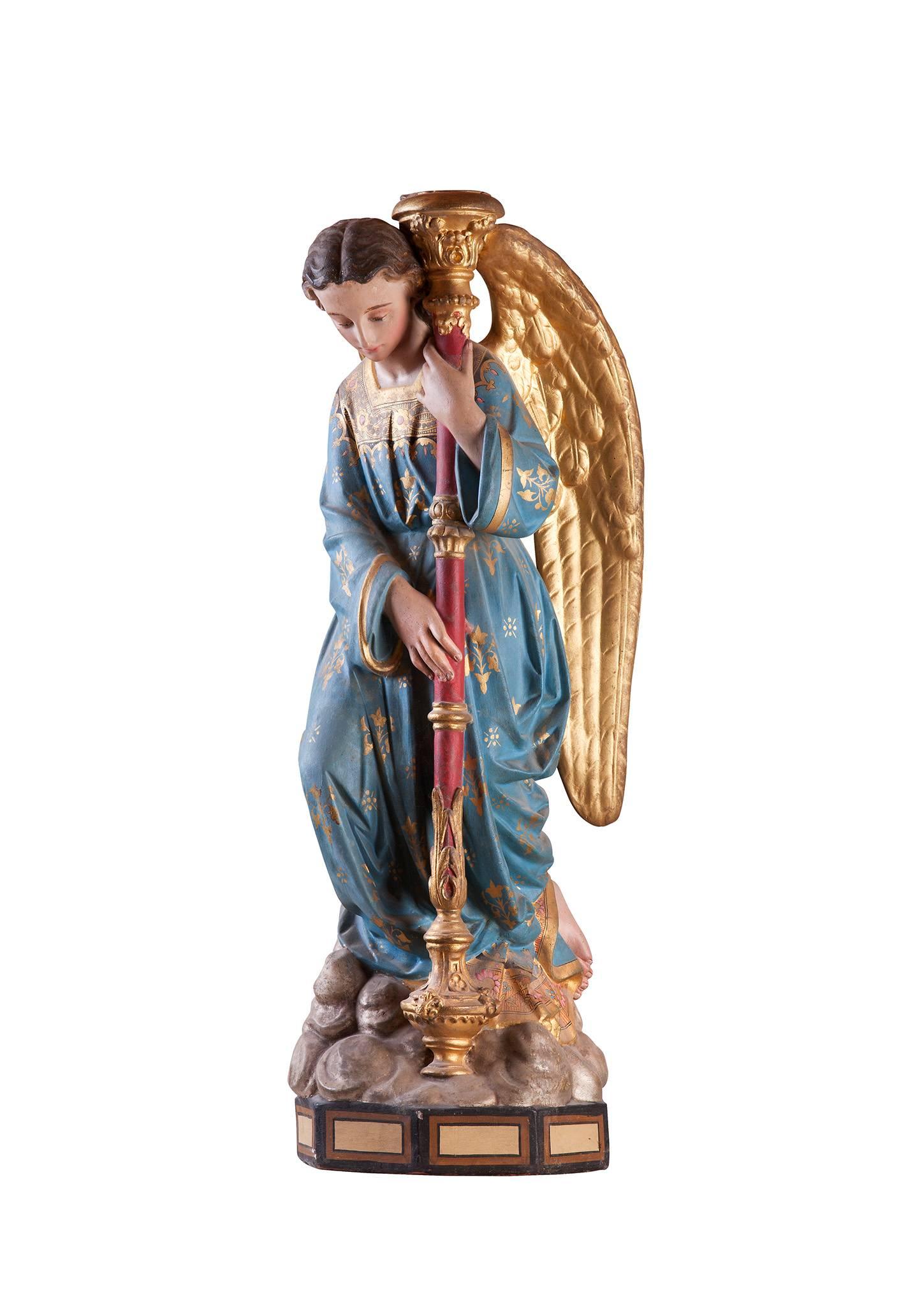 This is a very nice done statue Gothic Revival. Angel as candleholder on a cloud. Wonderful in color.