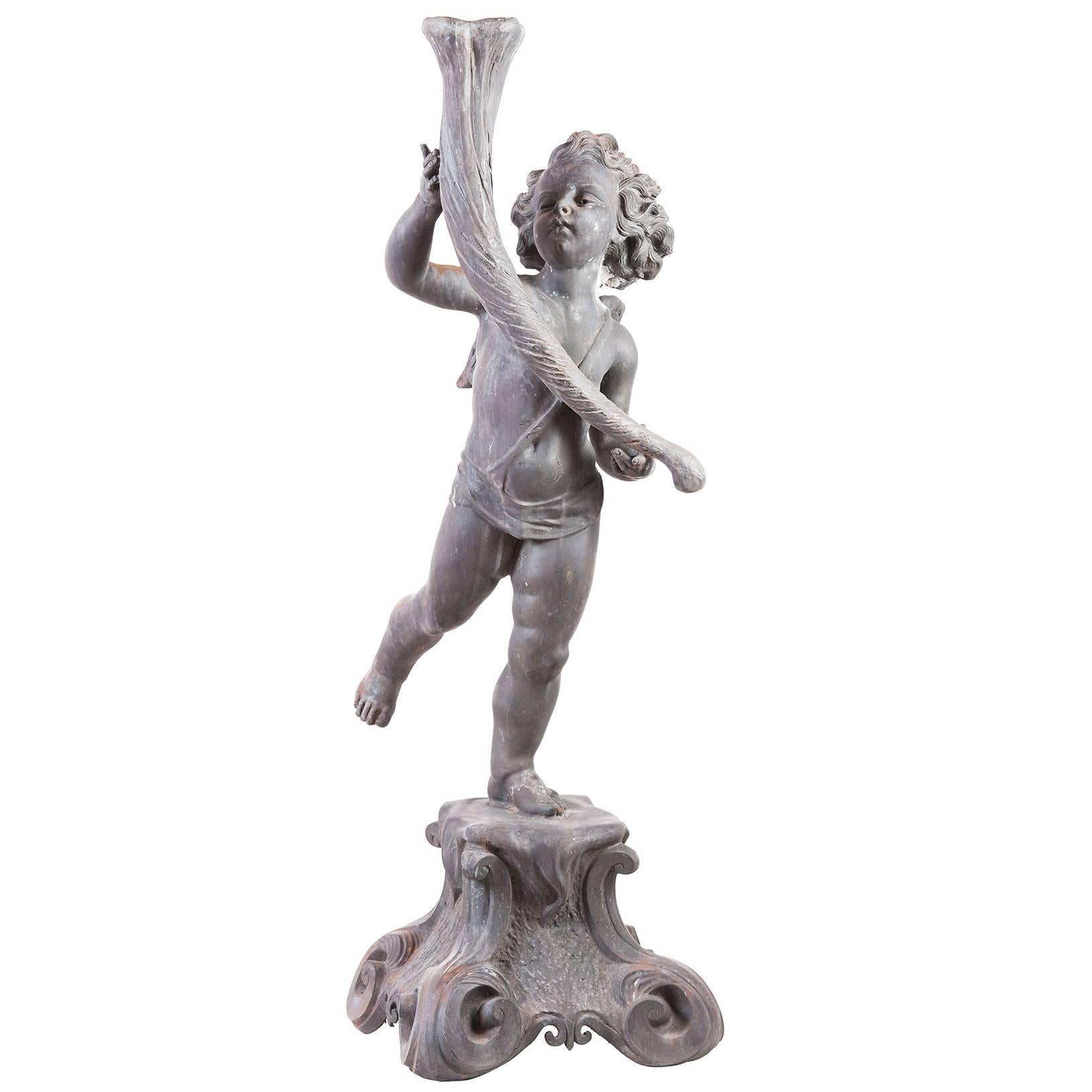 Putto with Horn For Sale