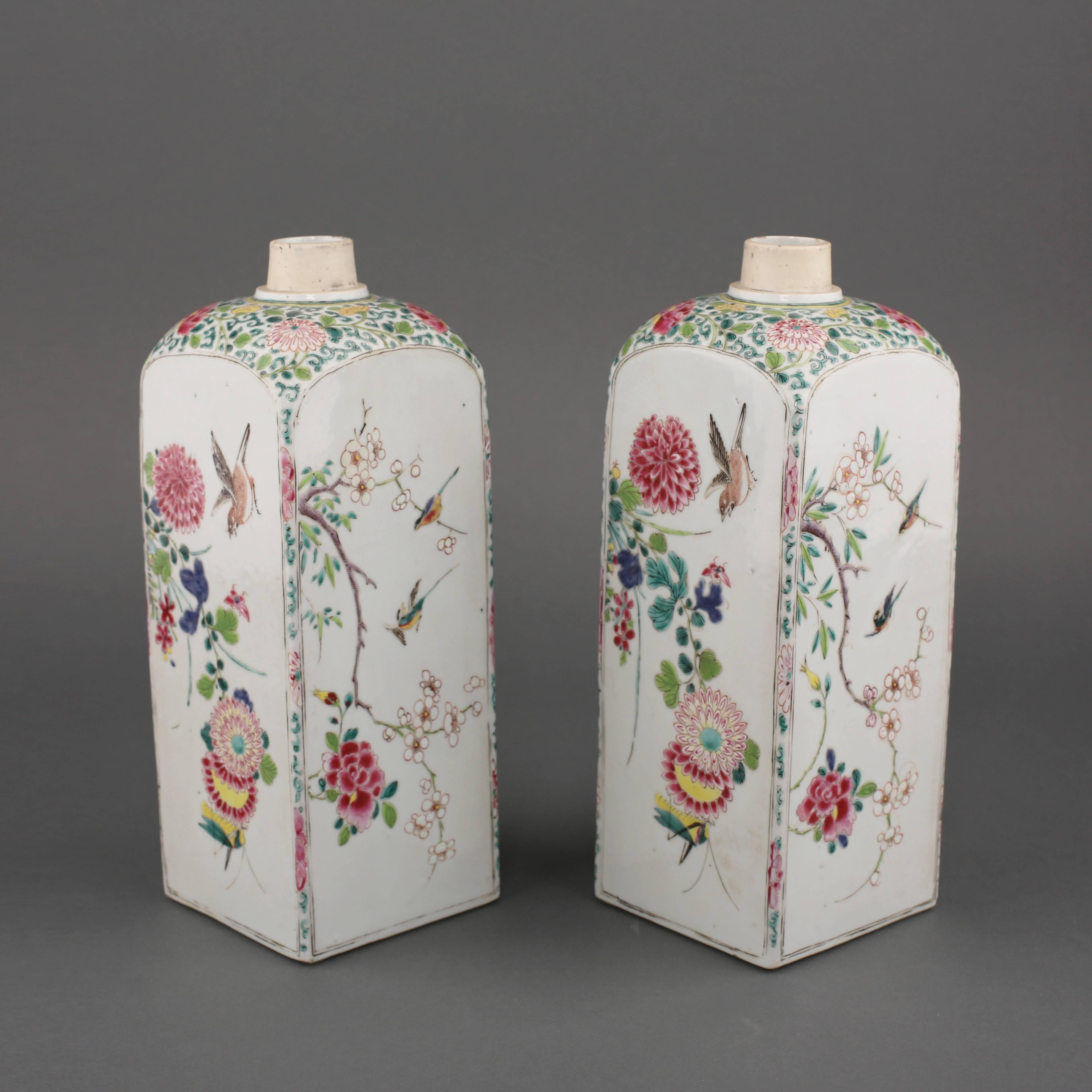 Pair of famille rose square canisters painted on each side with birds, butterflies and insects amongst flowering branches of peony, chrysanthemum and cherry blossom, all between a scroll ground with leaf and flower head pattern.

Metal
