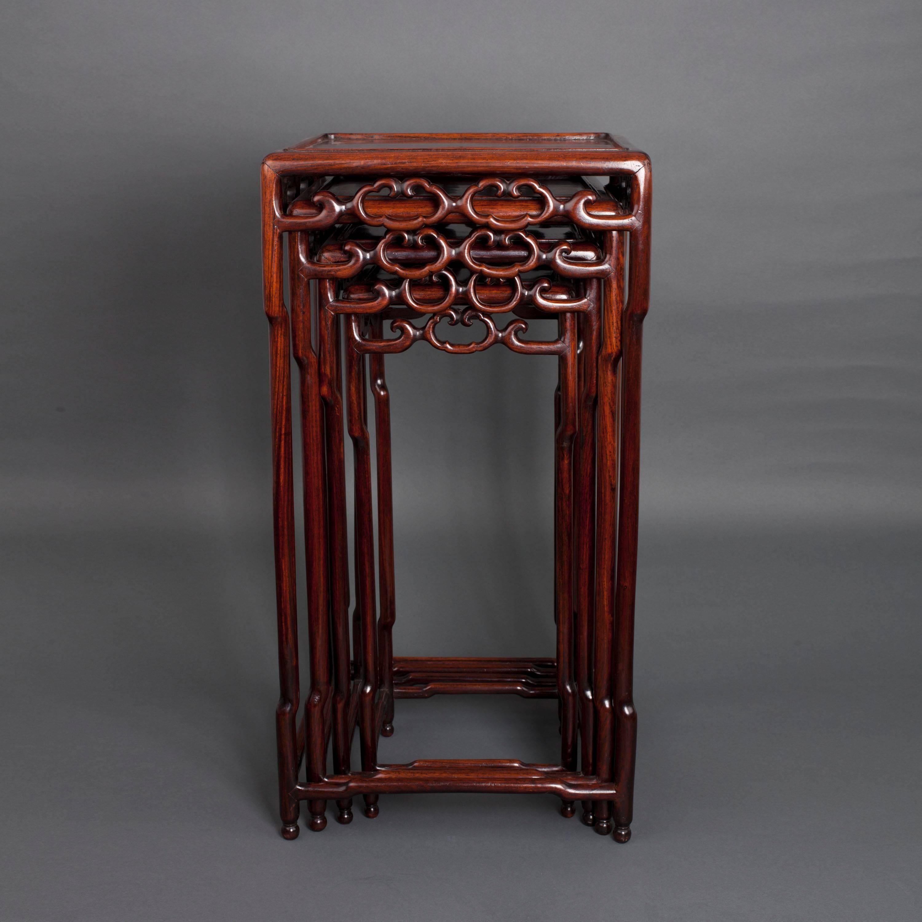Carved Chinese Hongmu Nest of Four Square Tables, circa 1900 For Sale