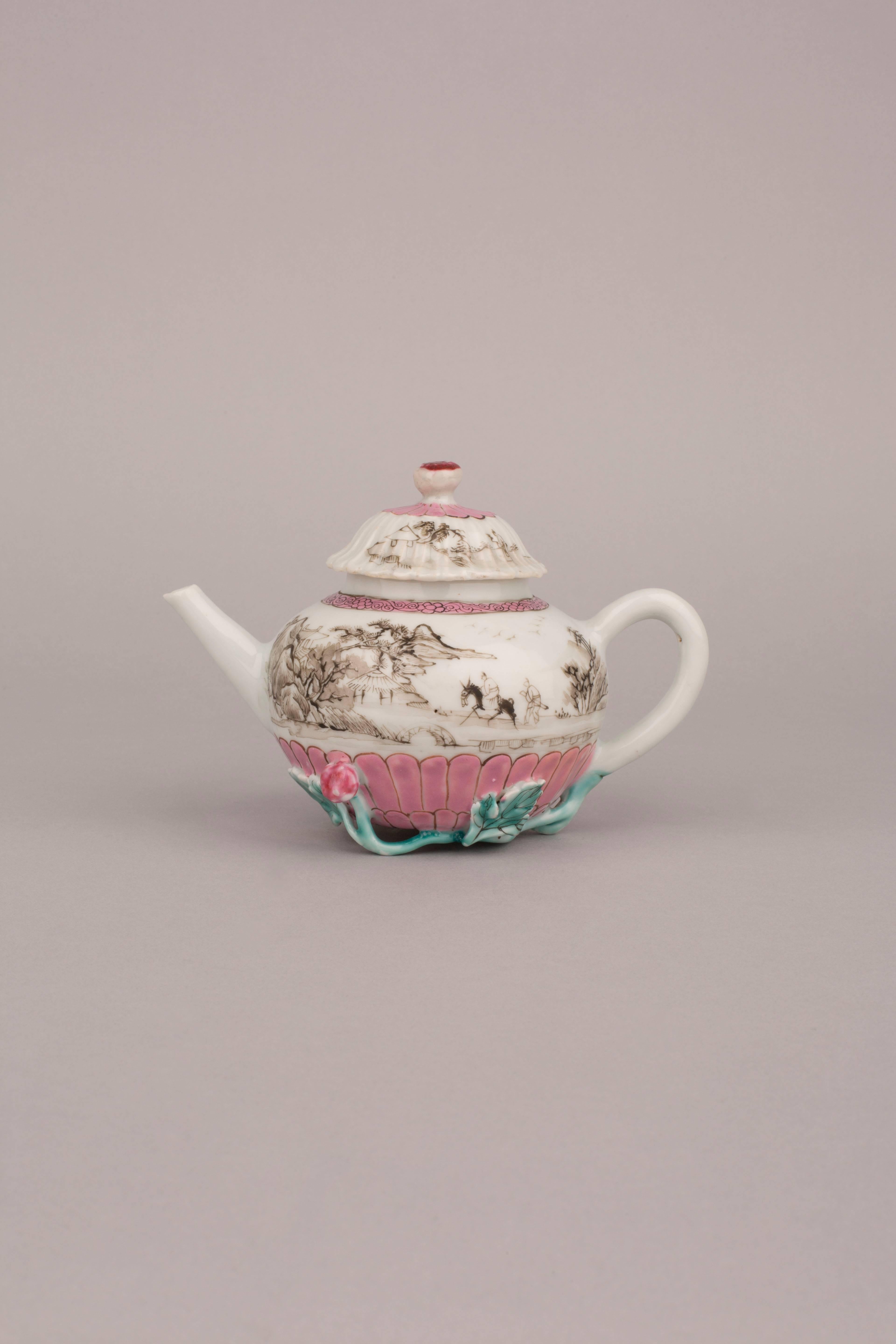 A Chinese famille rose export porcelain teapot and cover, the bottom half of the teapot moulded in the form of a chrysanthemum with leaves, buds and branches forming the foot, the body painted ingrisaille with a man riding a donkey and attendant in