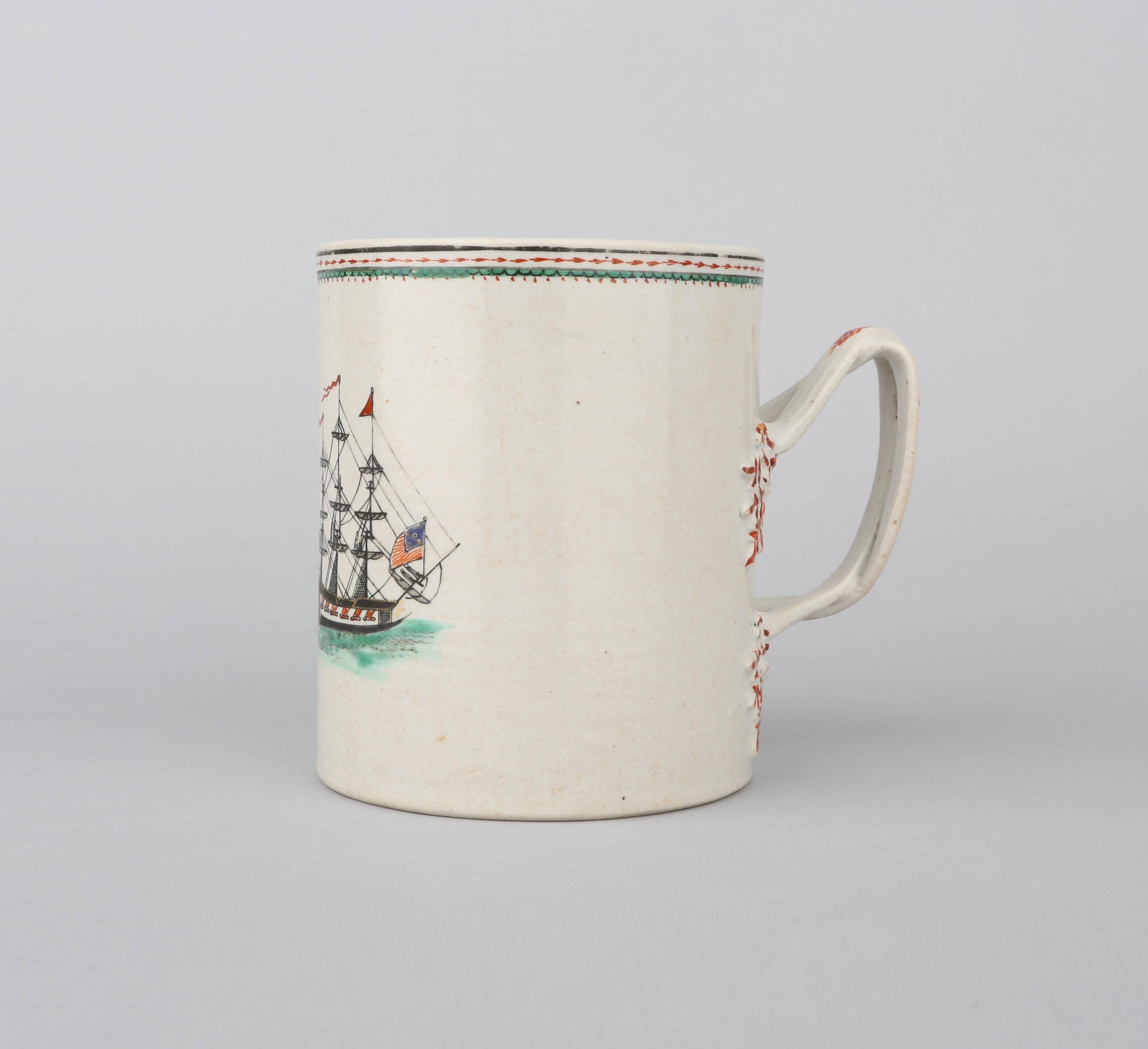 A Chinese export porcelain tankard painted in bright enamels with a ship flying American flags, a continuous decorative border at the rim, the handle of twisted rope form joining the body with leaf shape moulded pieces.

diameter 11.2cm, overall