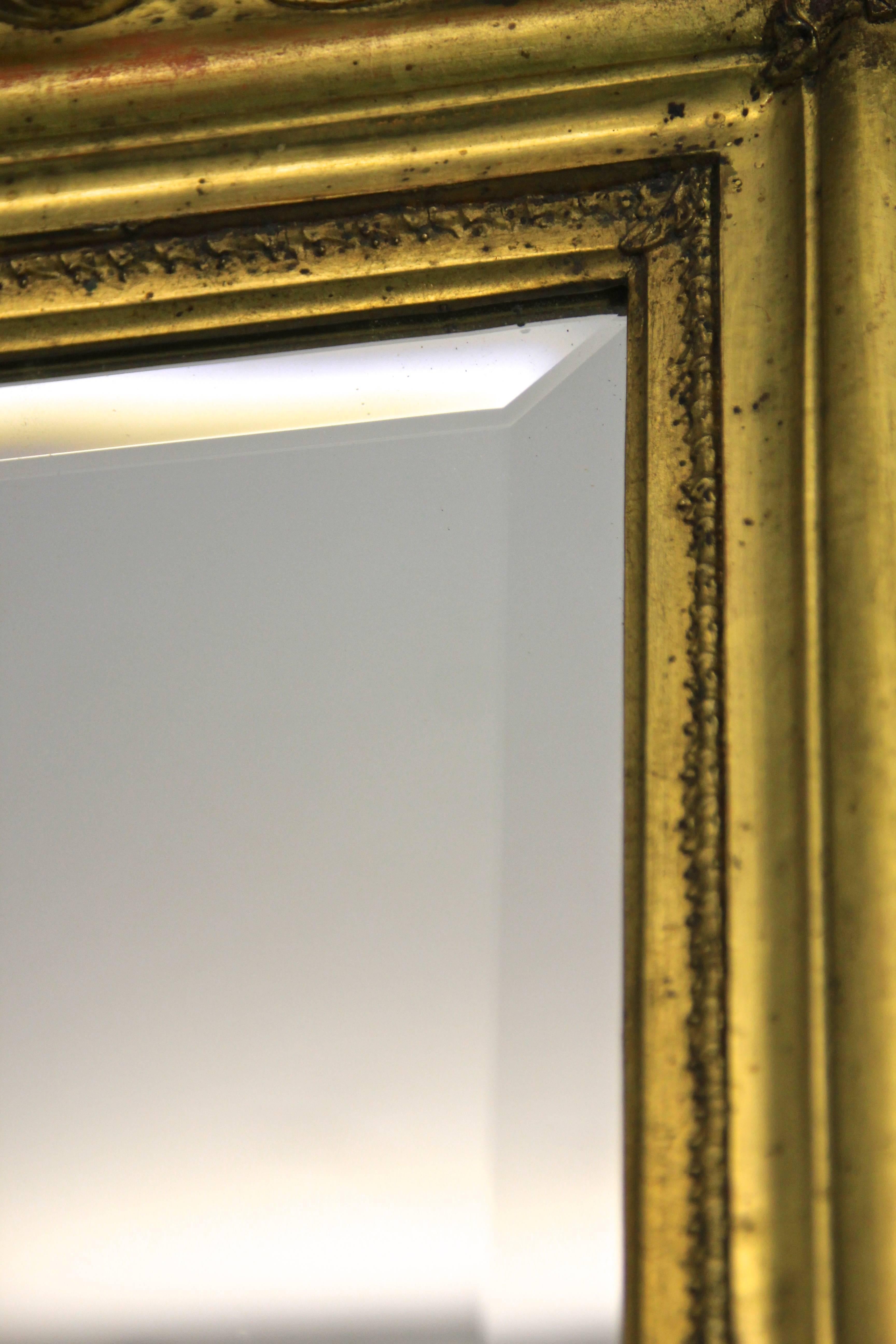 Take a look at this absolute fabulous Biedermeier mirror from Austria. After a travel of more then 180 years we took greatest care while restoring this unique mirror. The priority was to keep this great original look as best as we can. The light red