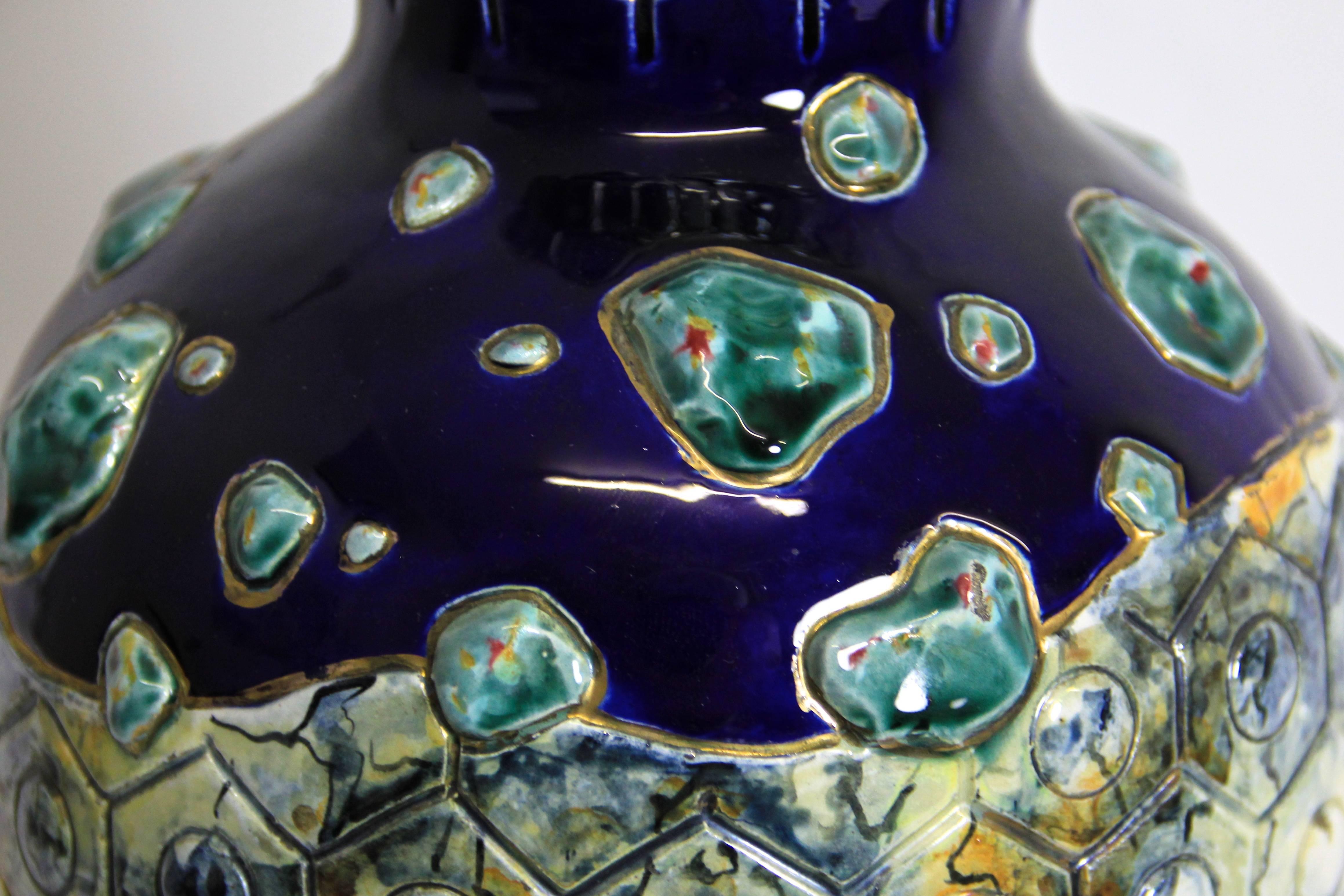Absolute unique Majolica work by WS&S from circa 1900. This beautifully designed and blue tone colored vase shows a light 