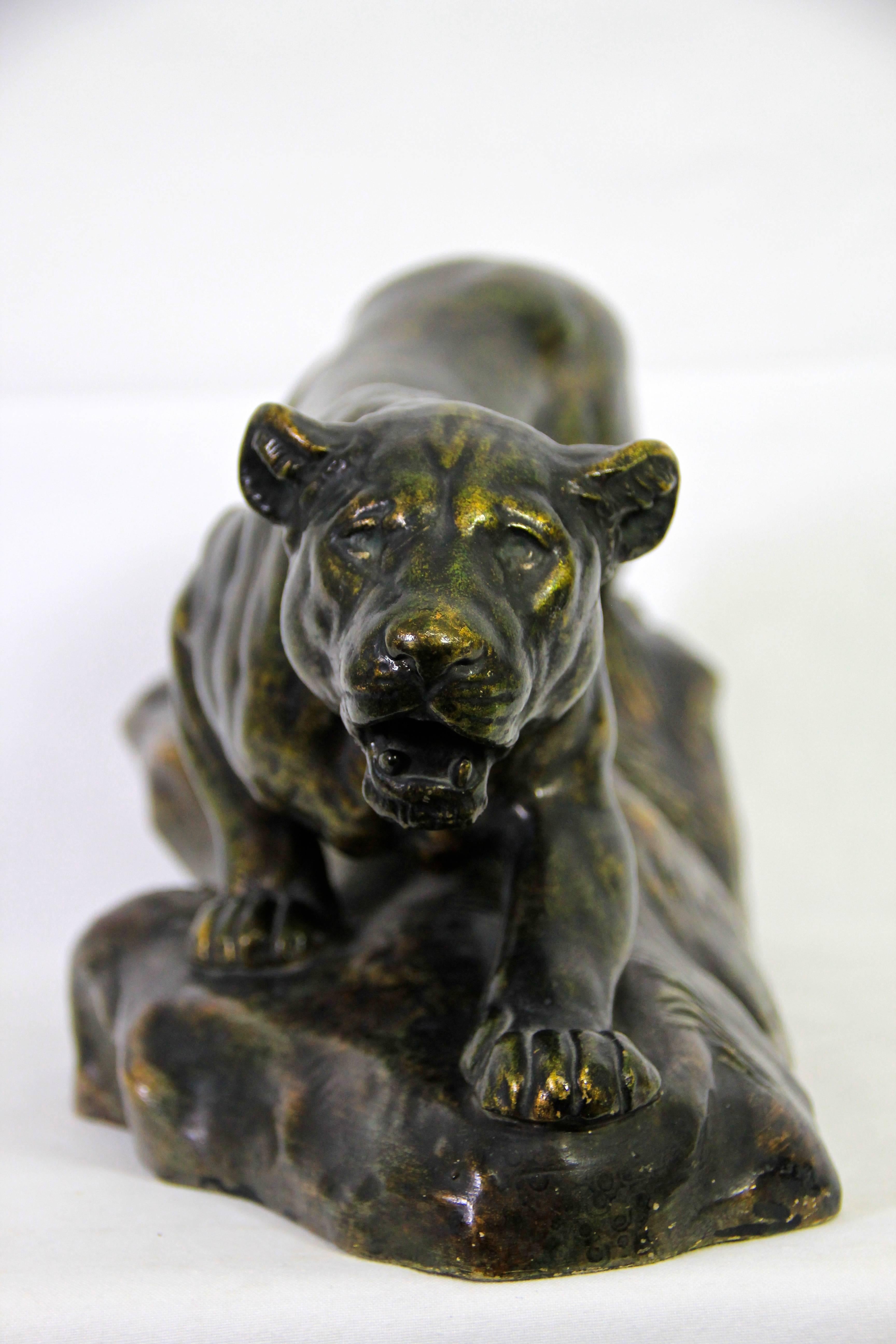 This exceptional Majolica Lioness sculpture is coming from the world renown manufacture of Bernhard Bloch-from the famous Eichwald region in Germany.
The perfect design of this very rare piece was created and signedby Th. Schoop. On the bottom you