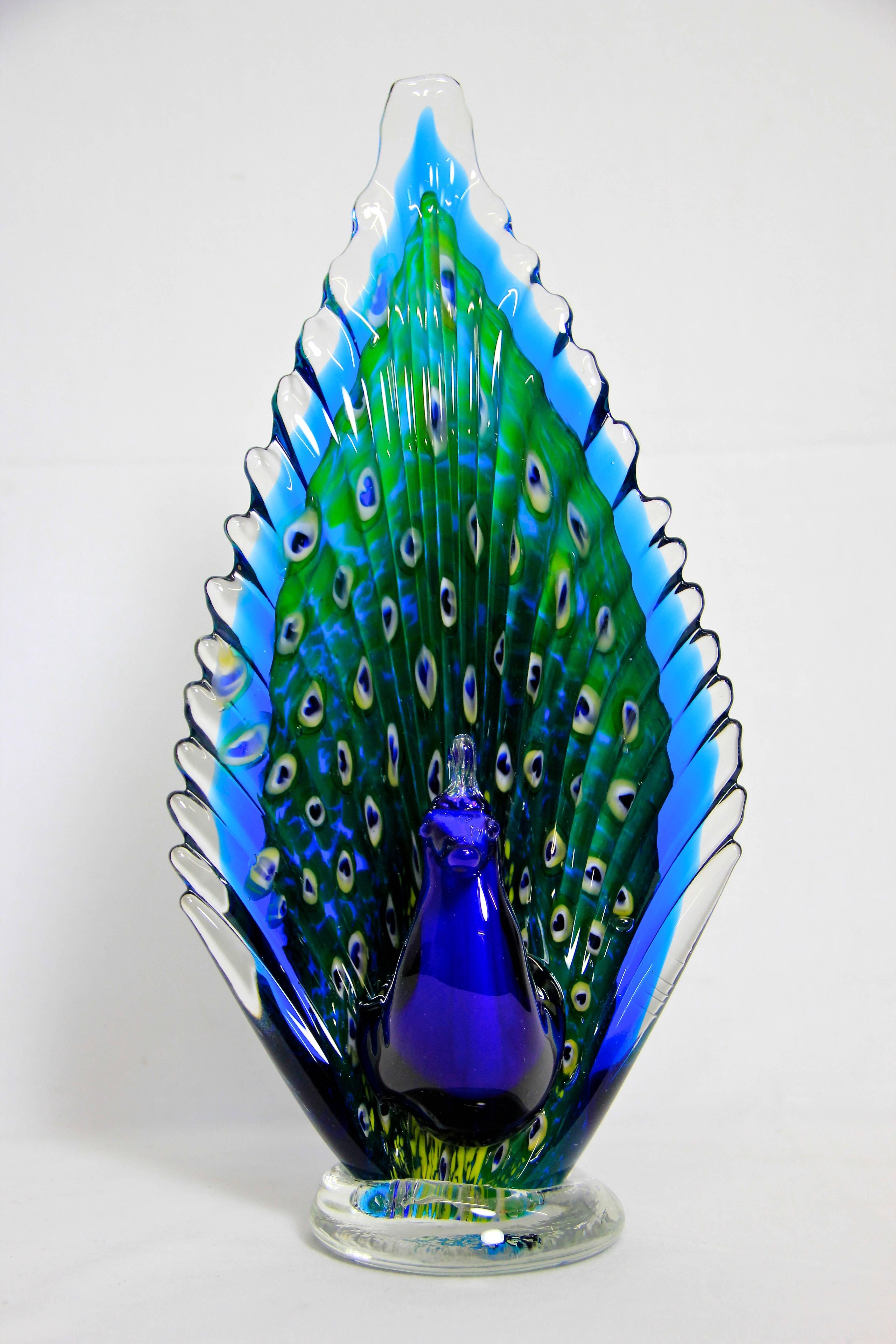In this selection we are offering you eight properly selected Murano Glass Art pieces in absolute excellent quality. Every collector knows we are talking about!
This amazing Murano Glass Peacock is the first piece of our rare Murano Glass