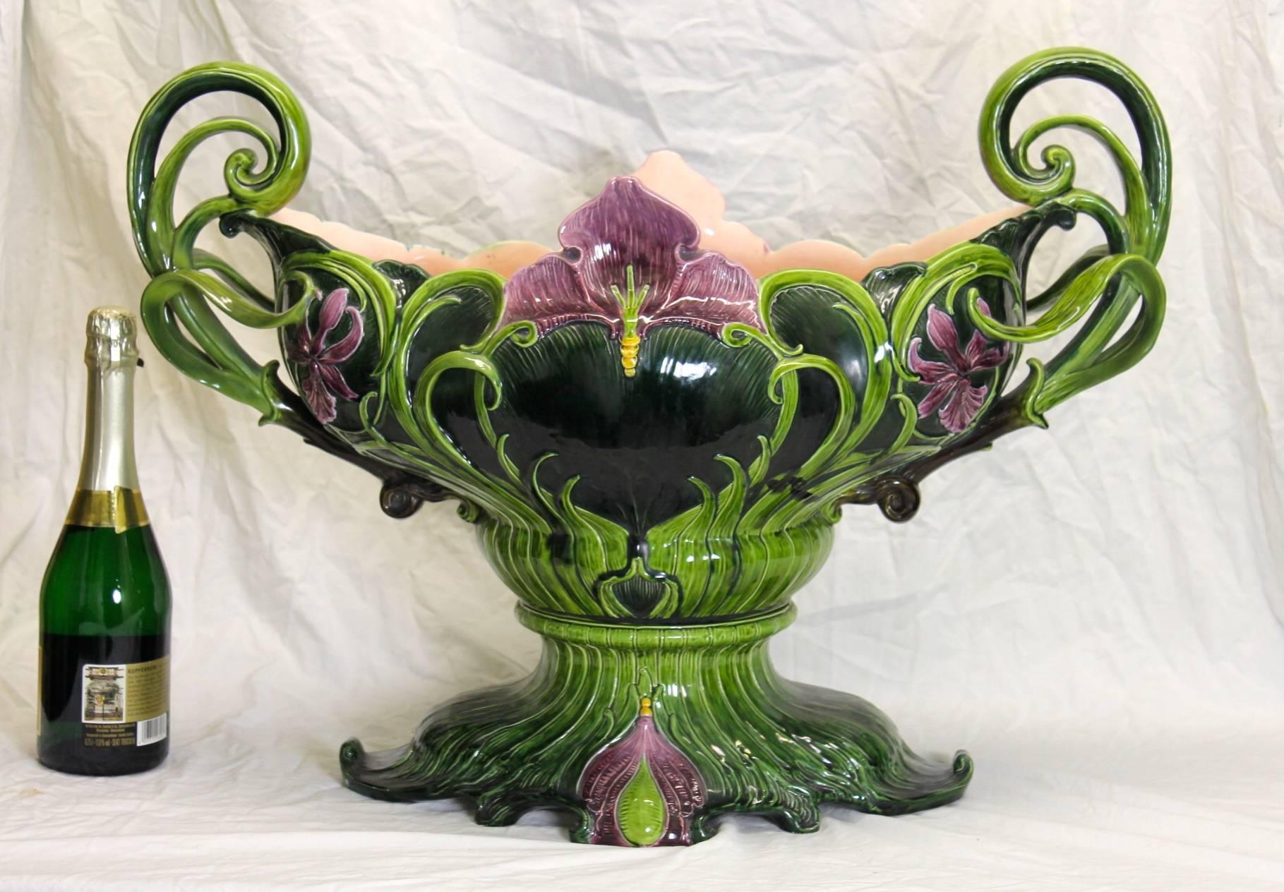 Absolute rare, outstanding monumental Art Nouveau Jardiniere from the early 20th century out of the world famous manufactory of Julius Dressler in Bohemia. A breathtaking Majolica masterpiece in this size (just watch the second picture with a