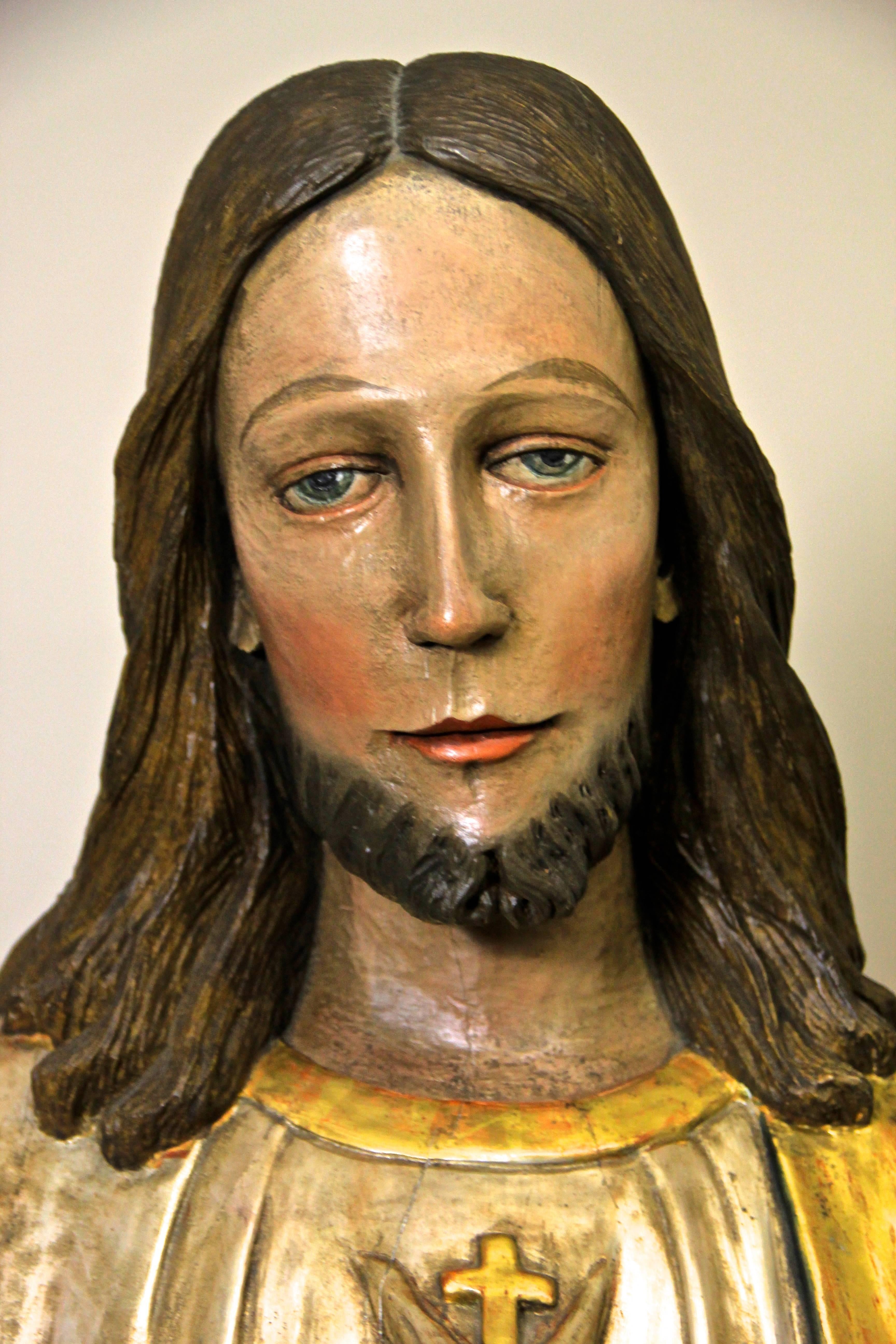 Life-size wooden Saint Statue of Jesus Christ made in Austria, circa first half of the 20th century.
This huge statue shows many fine details and was made with absolute perfection. Using different techniques in combination gold leaf, silver leaf