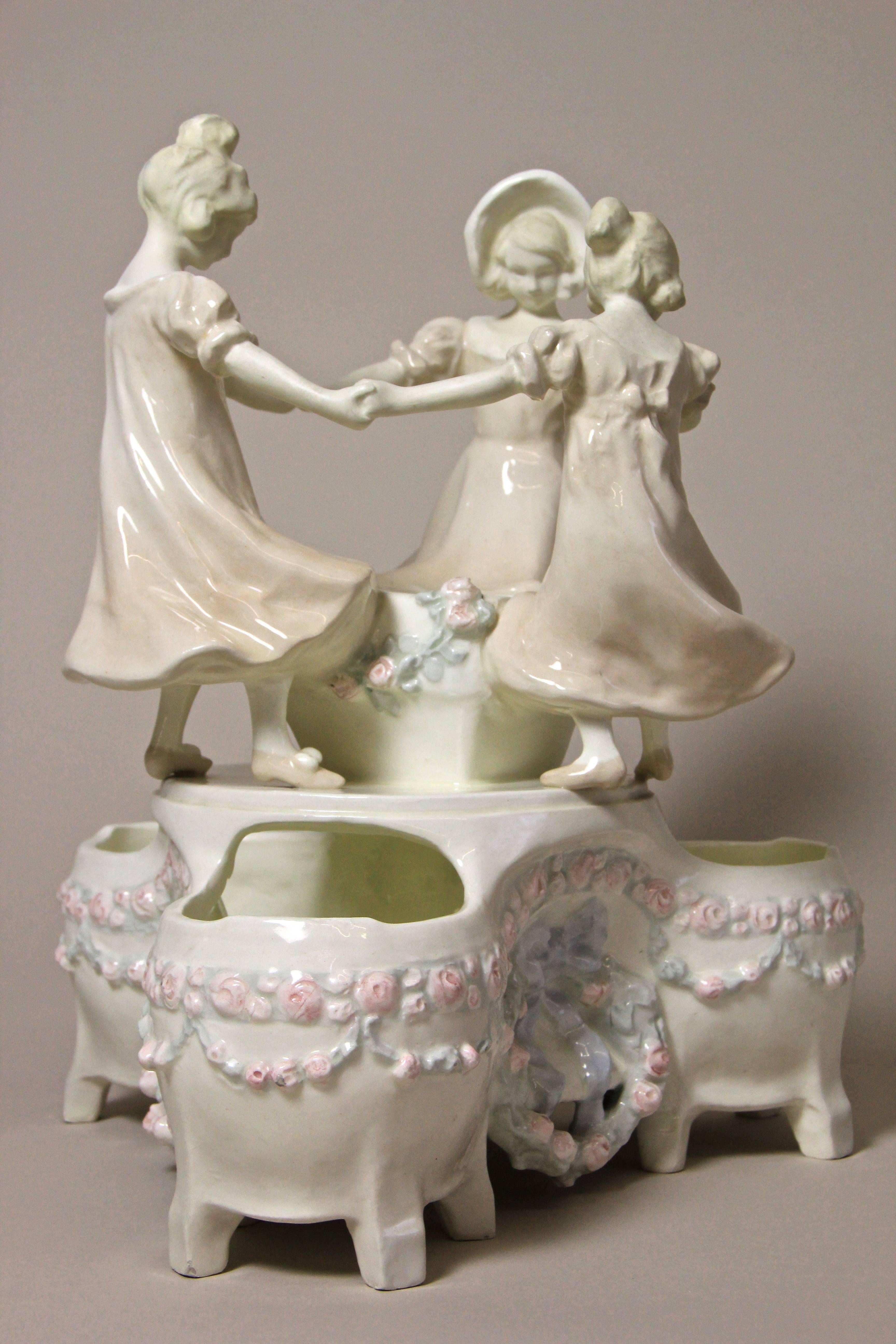 Impressive ceramic centrepiece by Schauer Ceramics, circa 1910. Schauer Ceramics was established 1900 in the beautiful city of Vienna and famous for its outstanding figurative items. This amazing centrepiece with three small bowls surrounded by