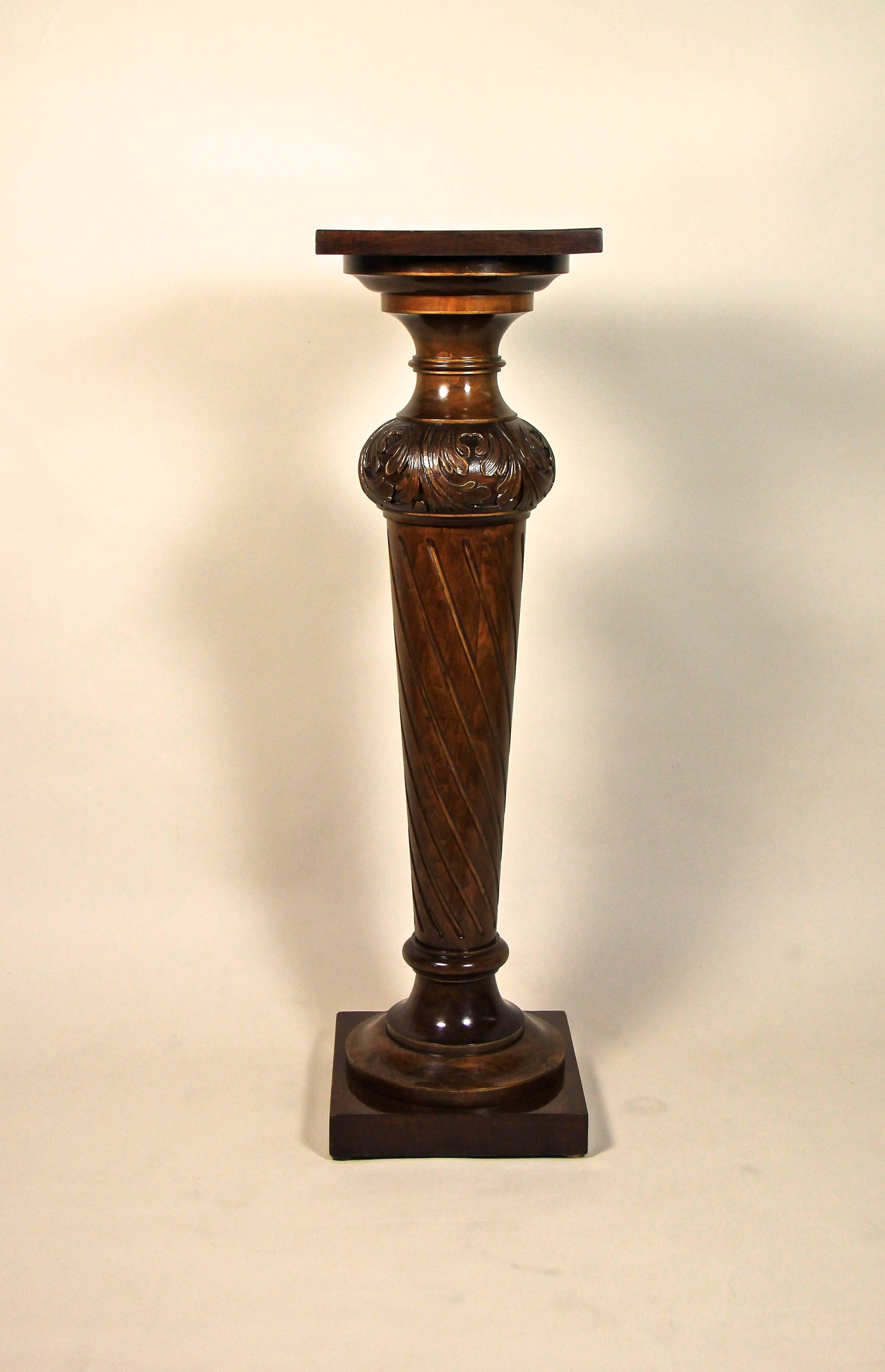 Wonderful solid nut wood pedestal from circa 1870 with classy hand-carved column. Whether you want to draw attention on a beautiful piece of ceramic, a bust or just wonderful flowers, this pedestal will definitely attract attention.