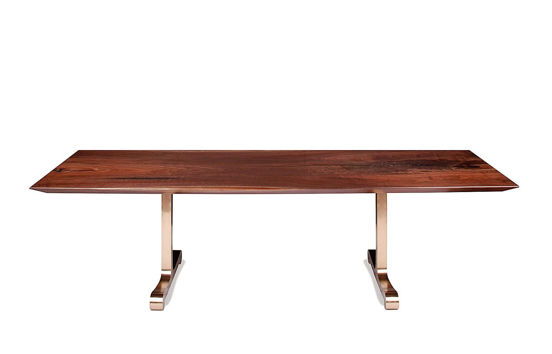 With it’s elegant curves and clean lines, the VIENNA Dining Table is a perfect fit for interiors that exhibit a sensuous and sophisticated design aesthetic.

The scroll motif has echoed through the history of architecture and design as a symbol for