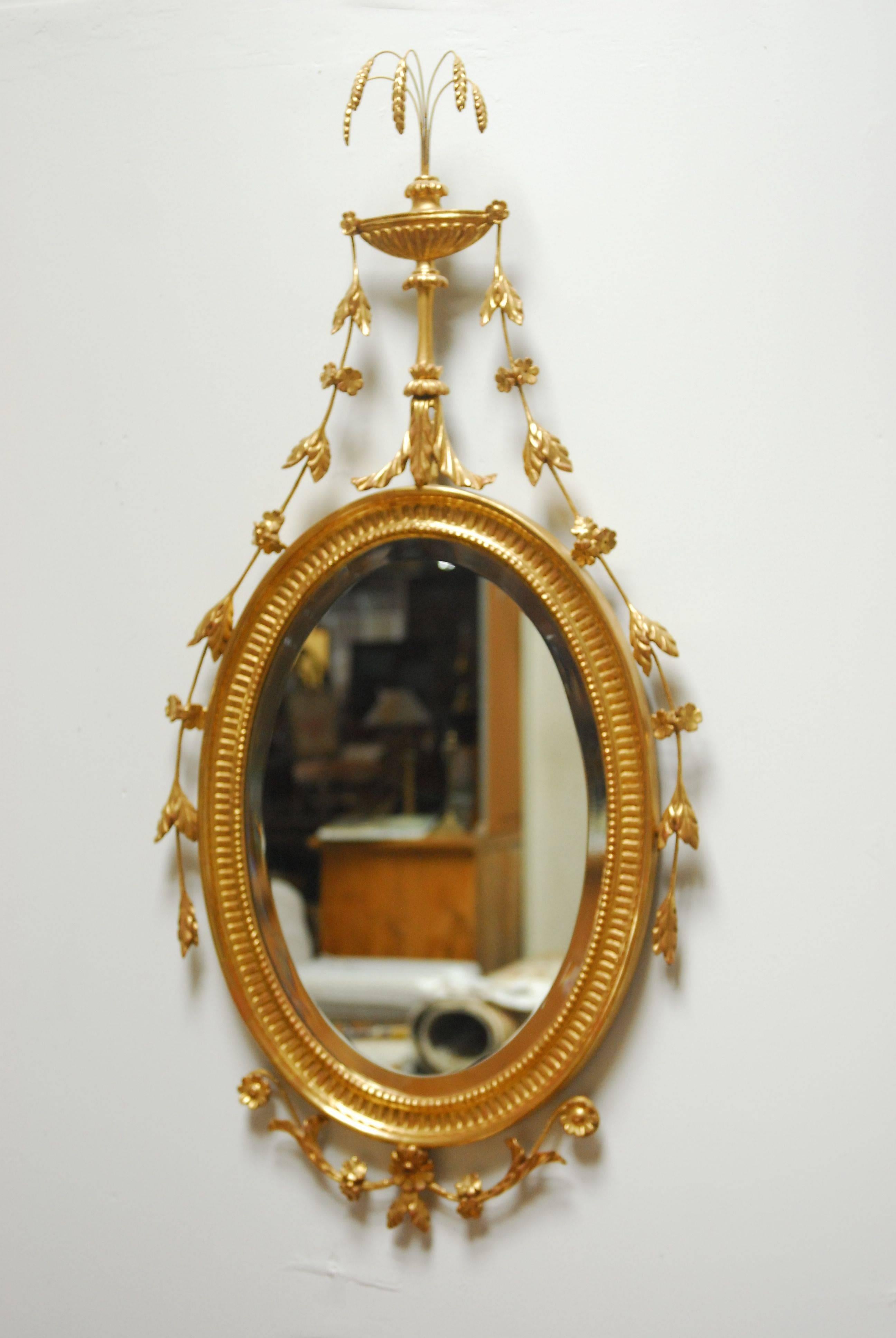 Beveled George III Adams Style Oval Giltwood Mirror