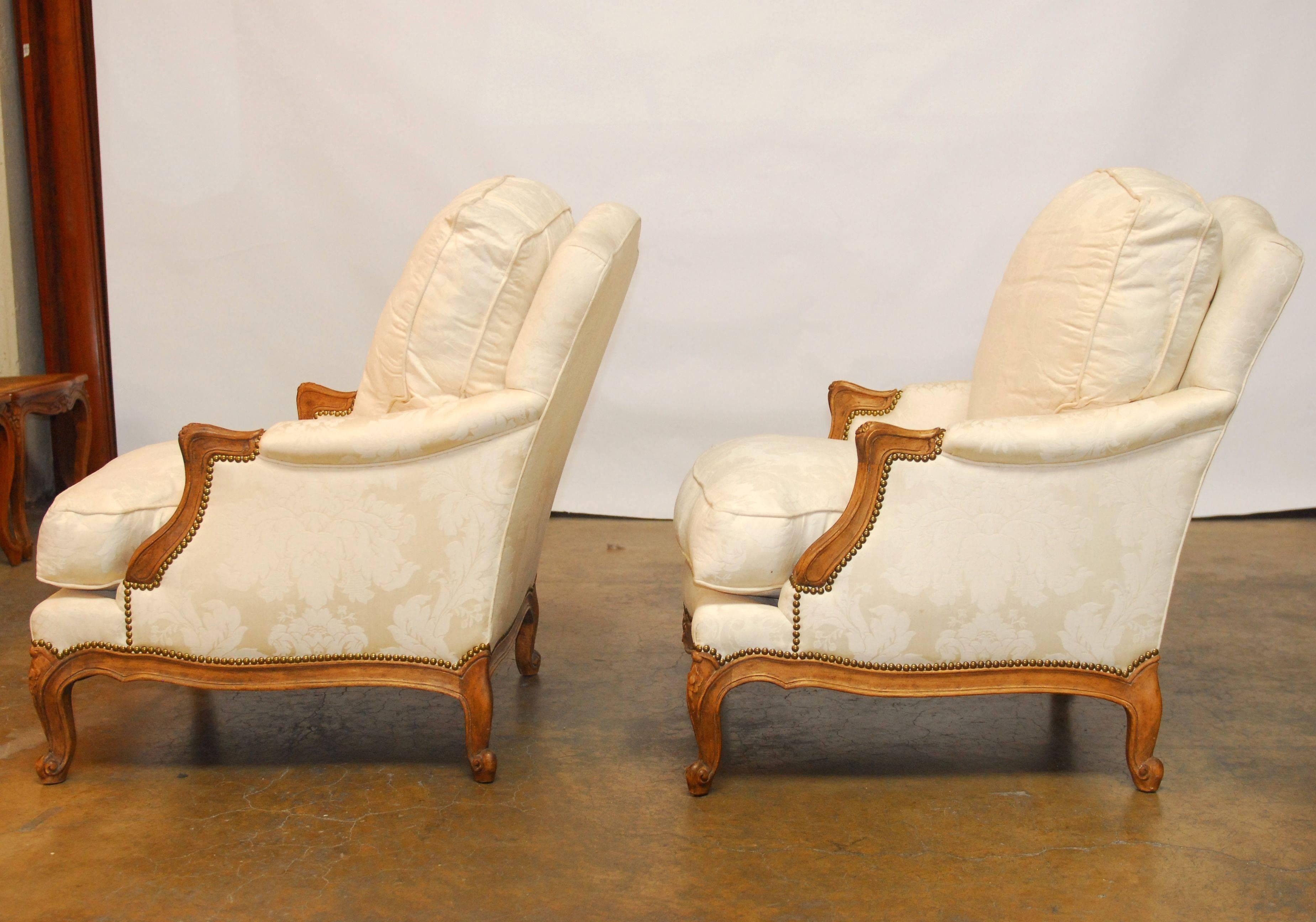 American Pair of French Walnut Bergeres by Minton-Spidell