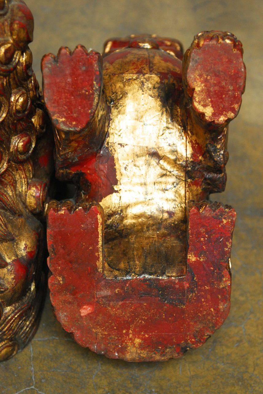 Pair of Large Chinese Gilt Temple Foo Dogs In Distressed Condition In Rio Vista, CA