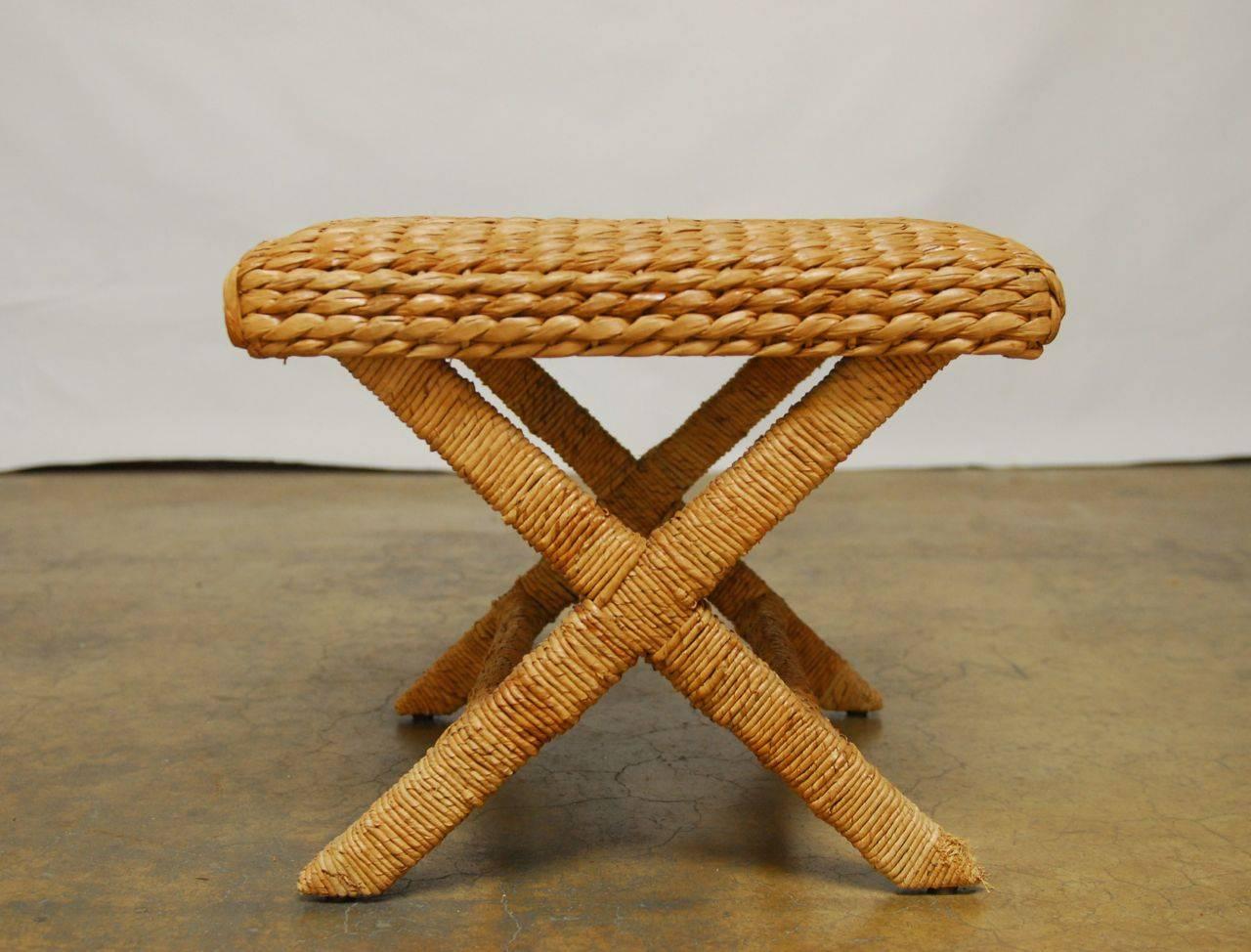 Fantastic pair of woven seagrass stools in the Classic X-form. Simple and rustic, yet contemporary lines, these will fit into almost any decor. Each leg is wrapped with a seagrass rope that completes the coastal bench look.