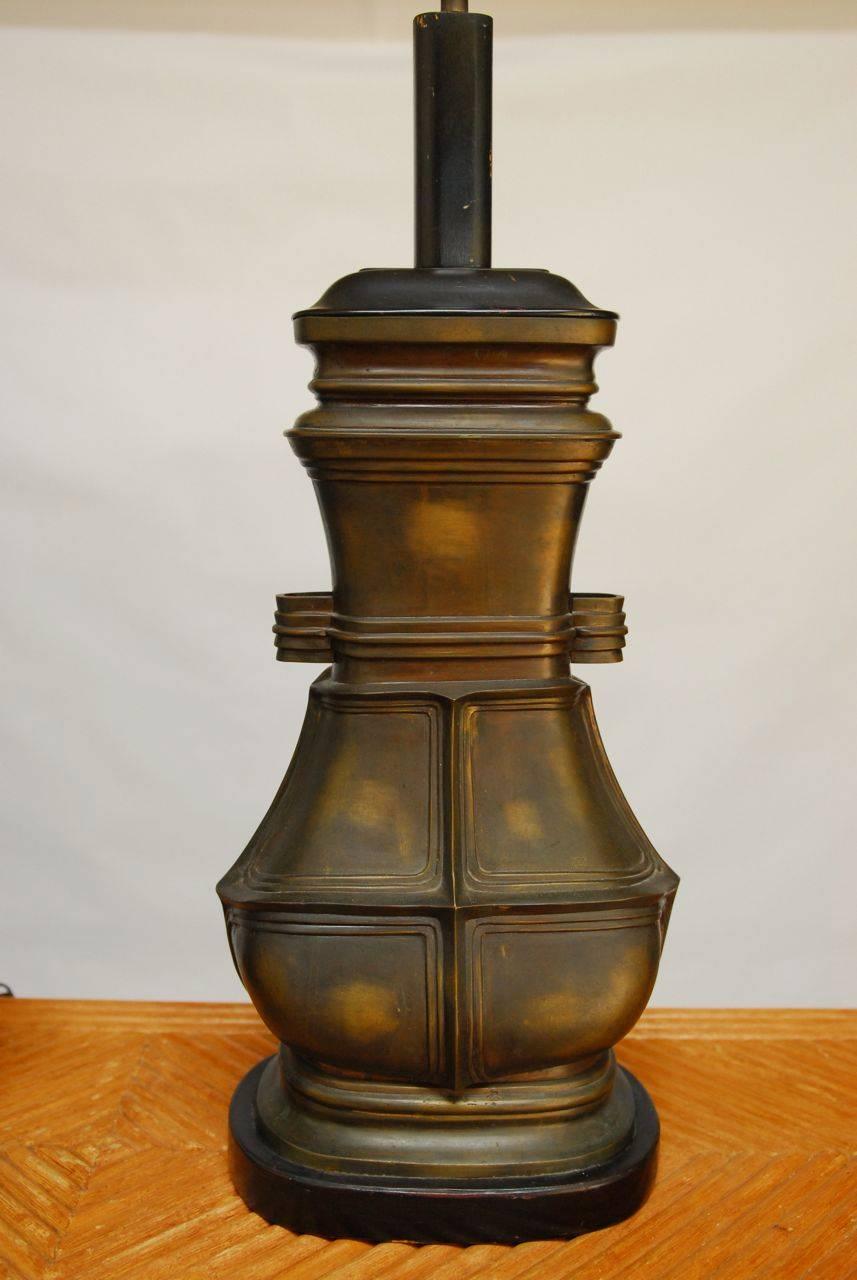 Incredible pair of massive Chinese style archaic bronze urn vessels mounted as table lamps. Custom artisan cast for an estate in San Francisco CA. We have never encountered bronze lamps near this size before. Gorgeous antiqued patina completes the