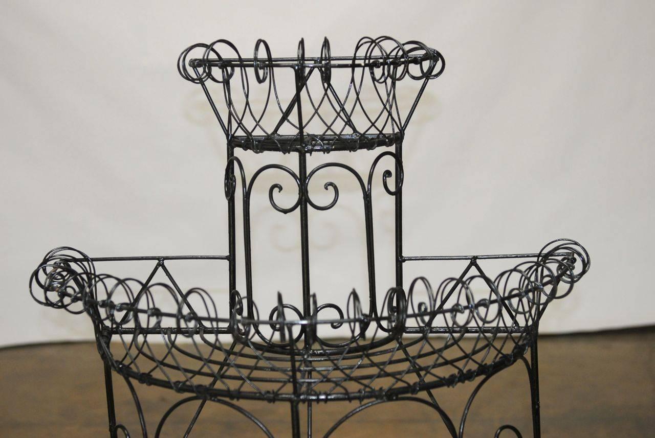 antique french wire plant stand