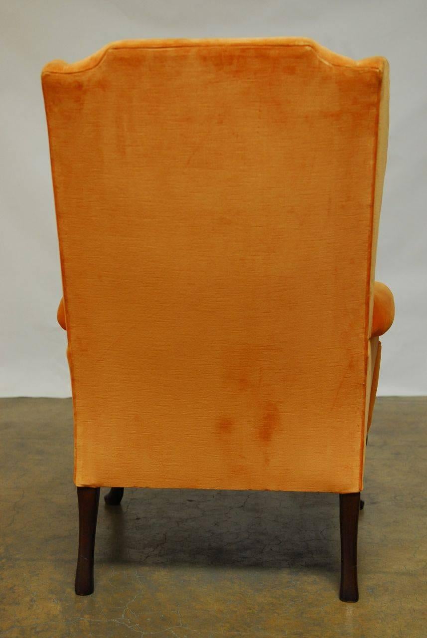 orange wing chair