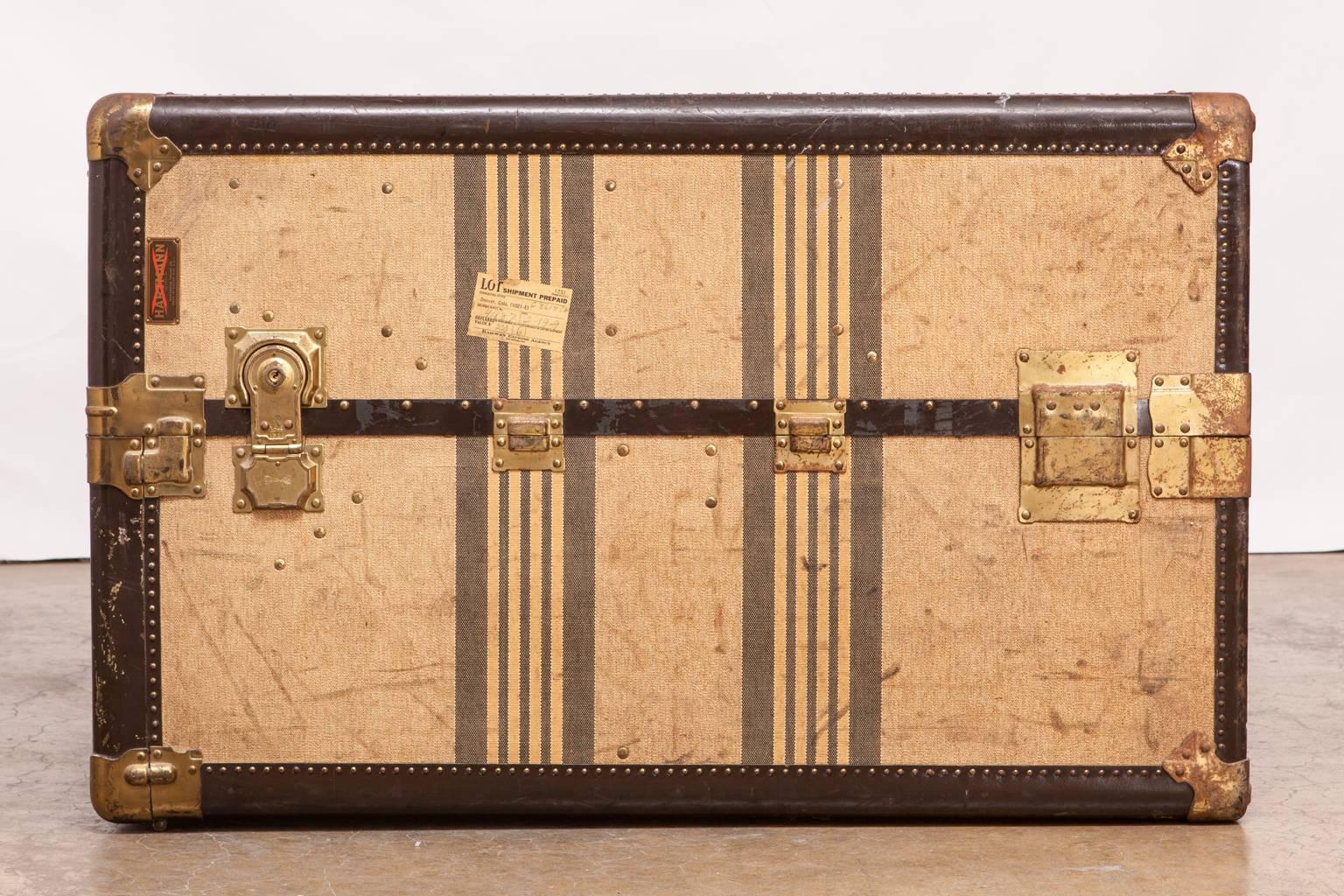 Exceptional canvas striped wardrobe steamer trunk made in the Louis Vuitton style by Hartmann belonging to Sylvia McLaughin (born Sylvia Cranmer, 1916-2016) an American pioneer in environmentalism. She founded the San Francisco Bay Association known